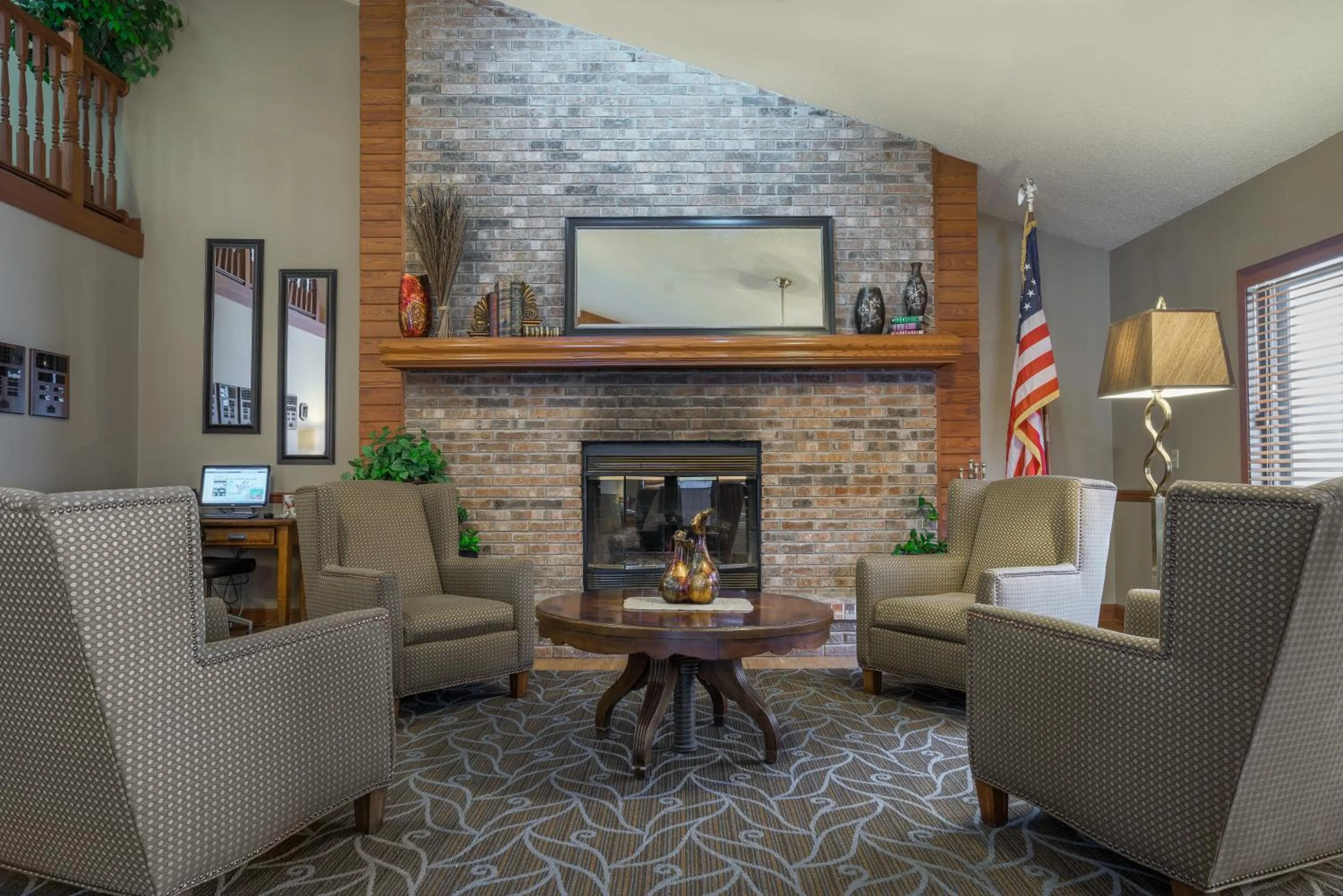 Lobby or reception in AmericInn by Wyndham Hutchinson