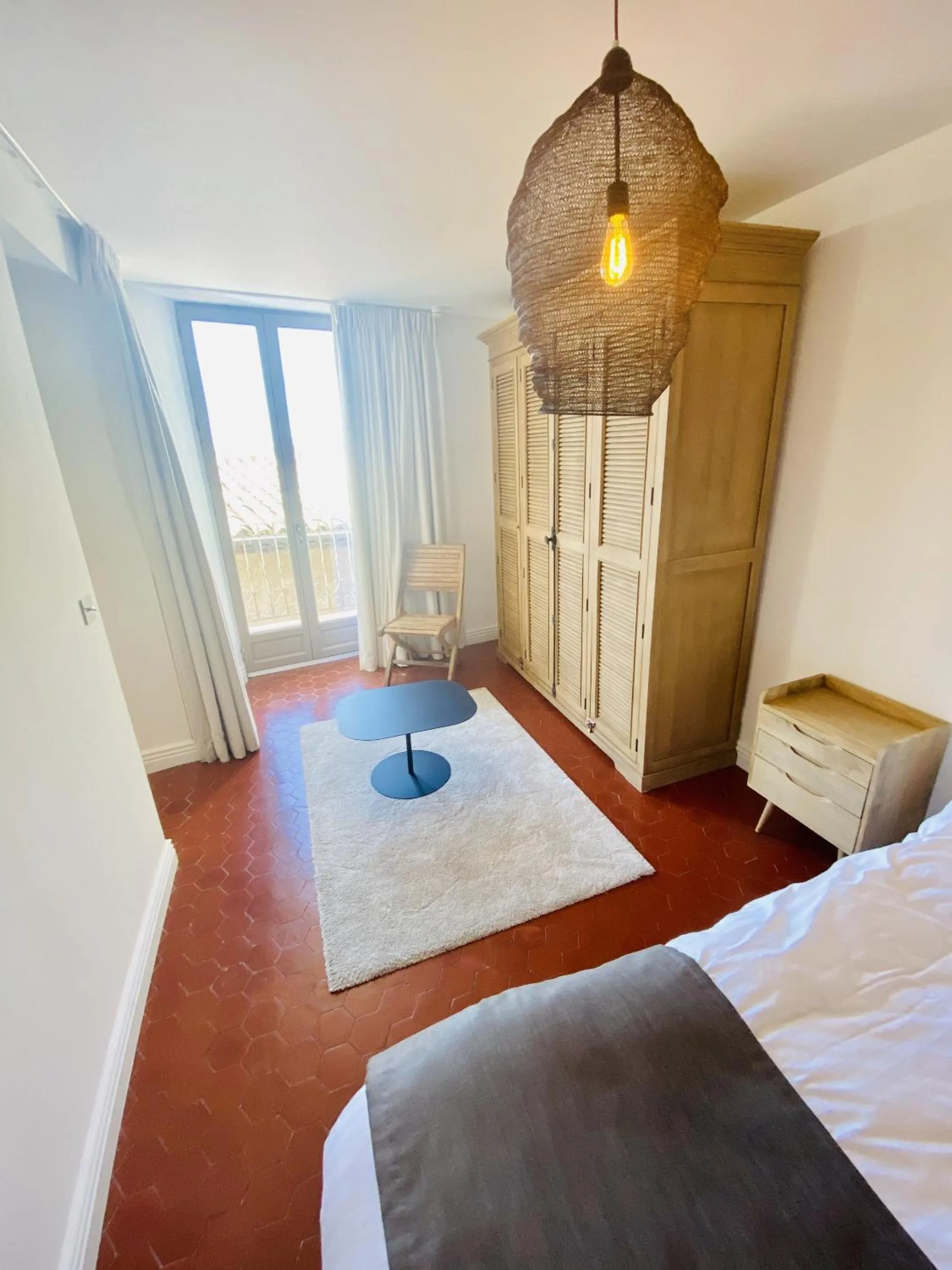 Bedroom in Hostellerie de la fontaine