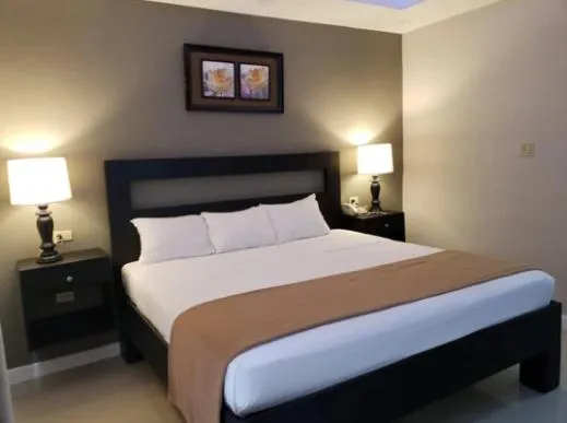 Bed in Christar Villas Hotel