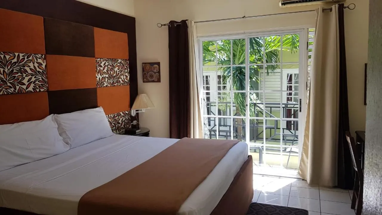 Bed in Christar Villas Hotel