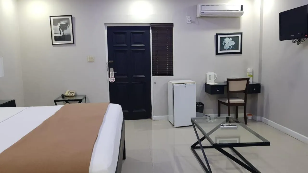 Bed in Christar Villas Hotel