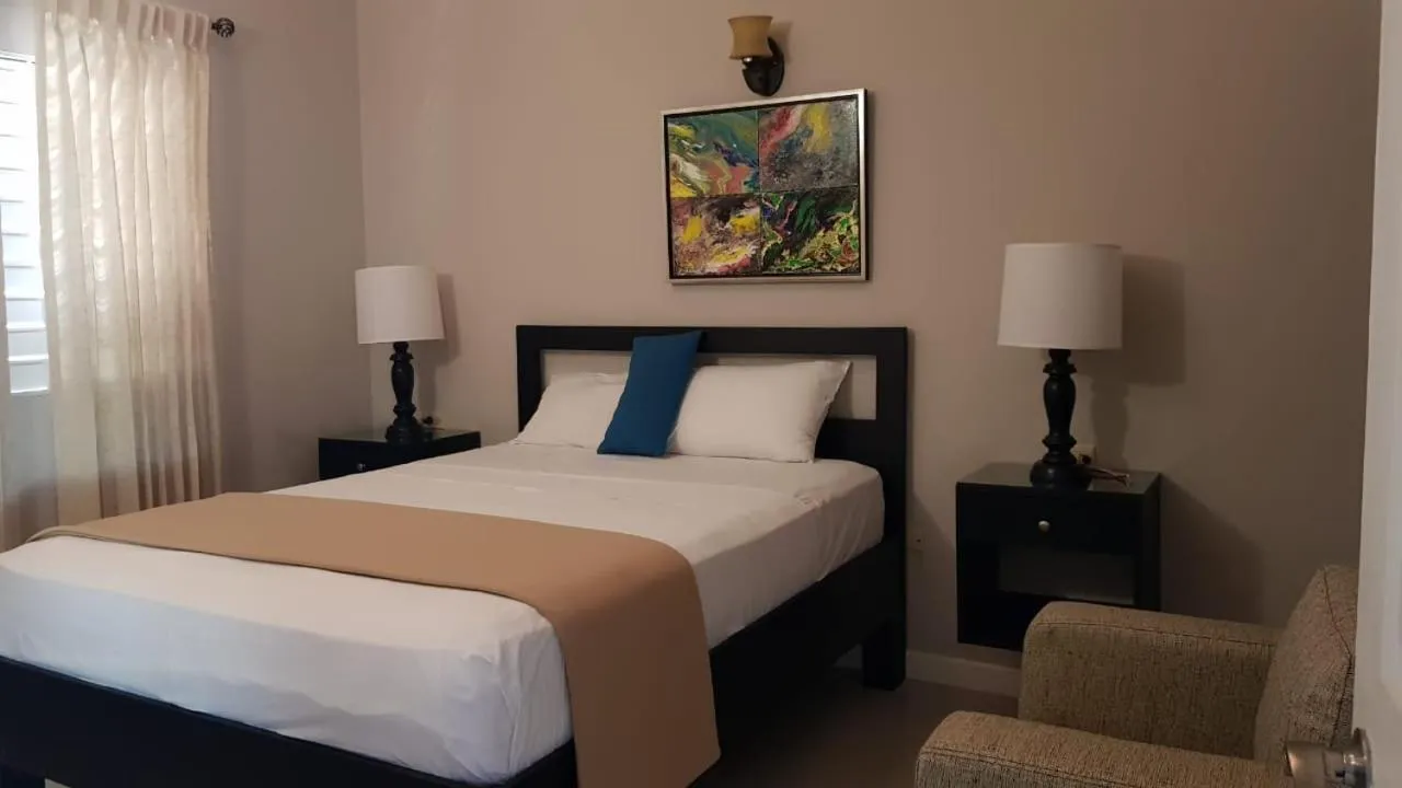 Bed in Christar Villas Hotel