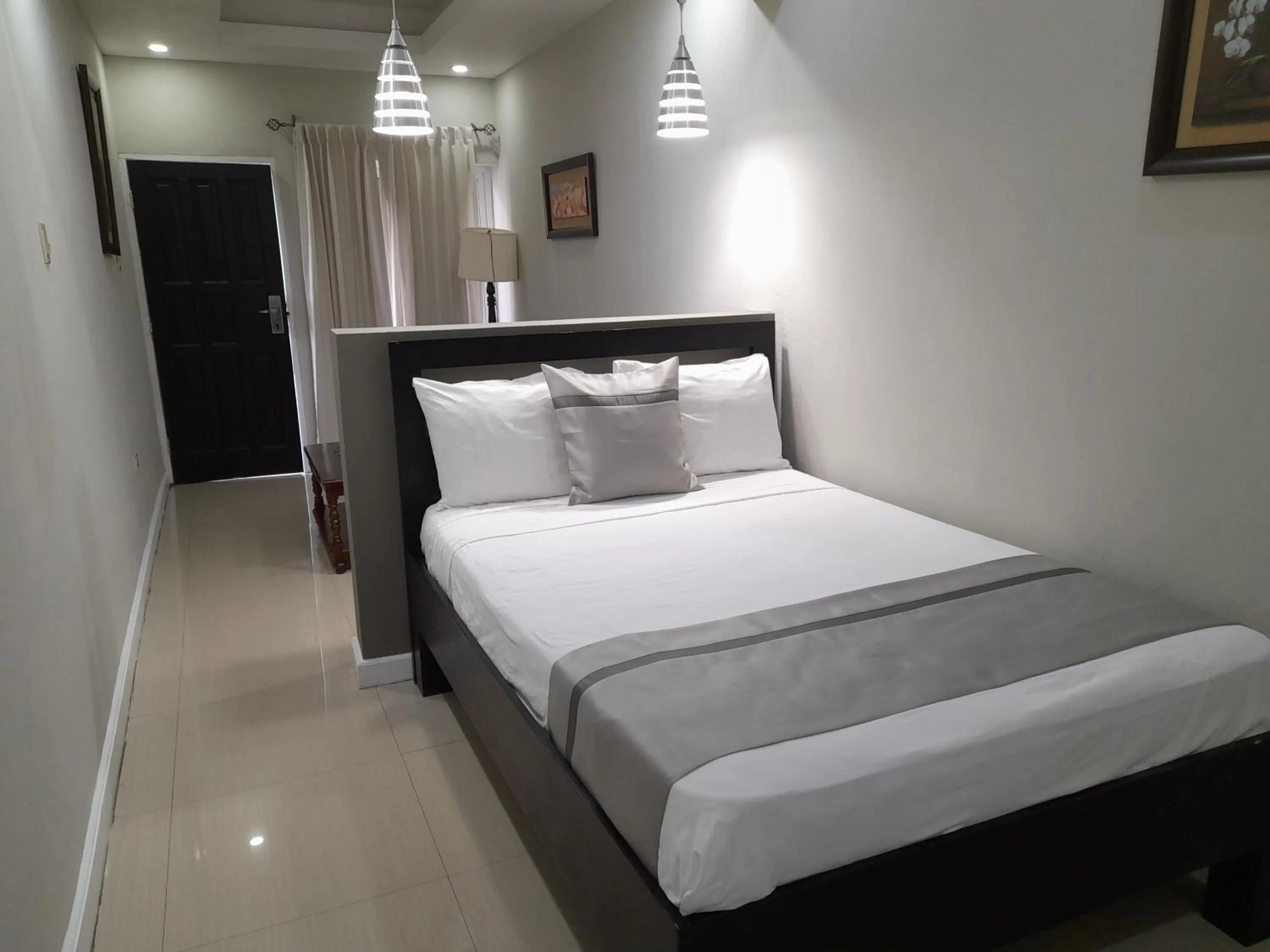 Bed in Christar Villas Hotel
