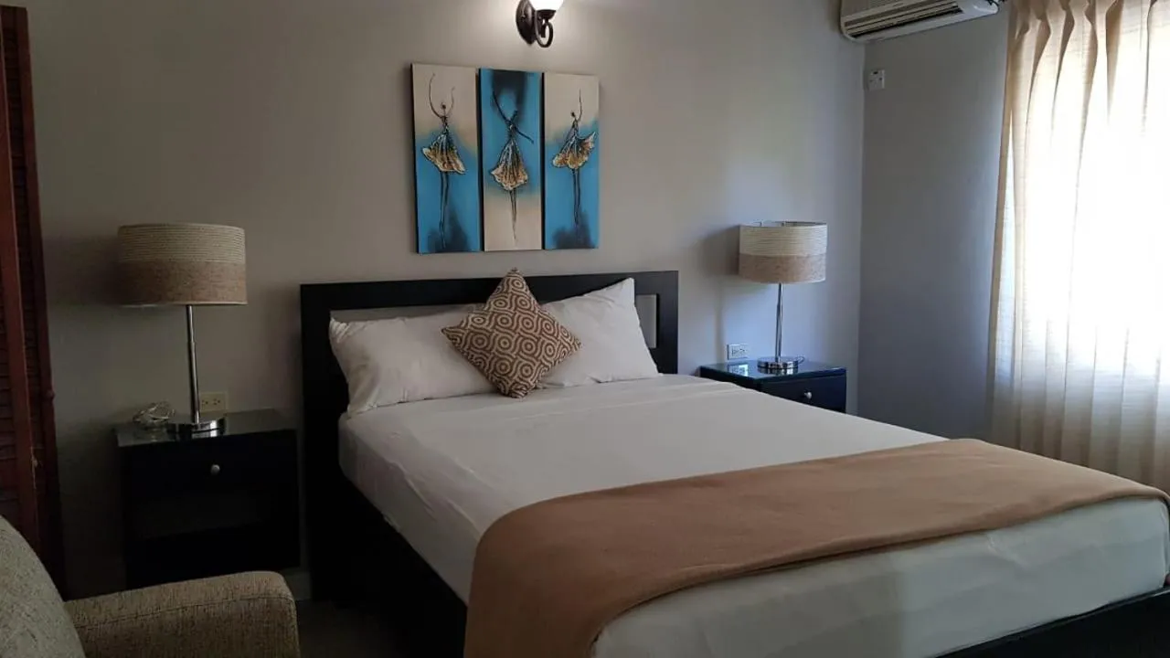 Bed in Christar Villas Hotel