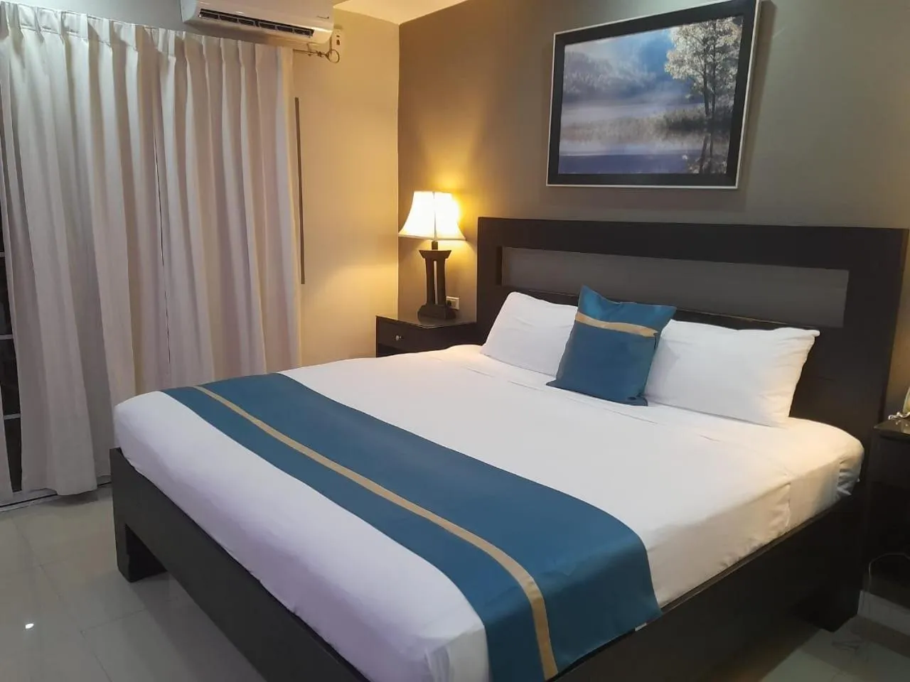 Bed in Christar Villas Hotel