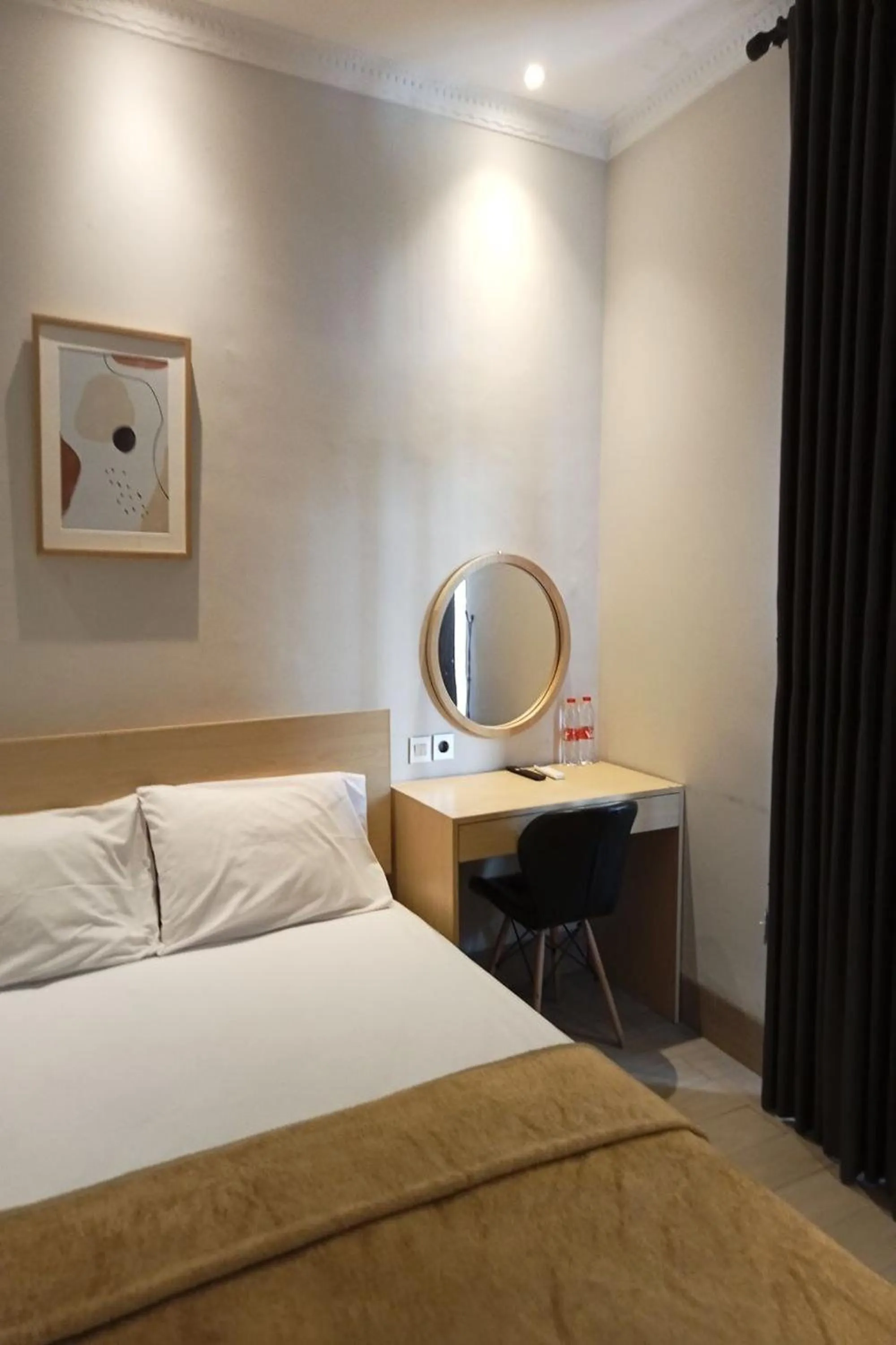 Bed in Hotel Bugis Asri