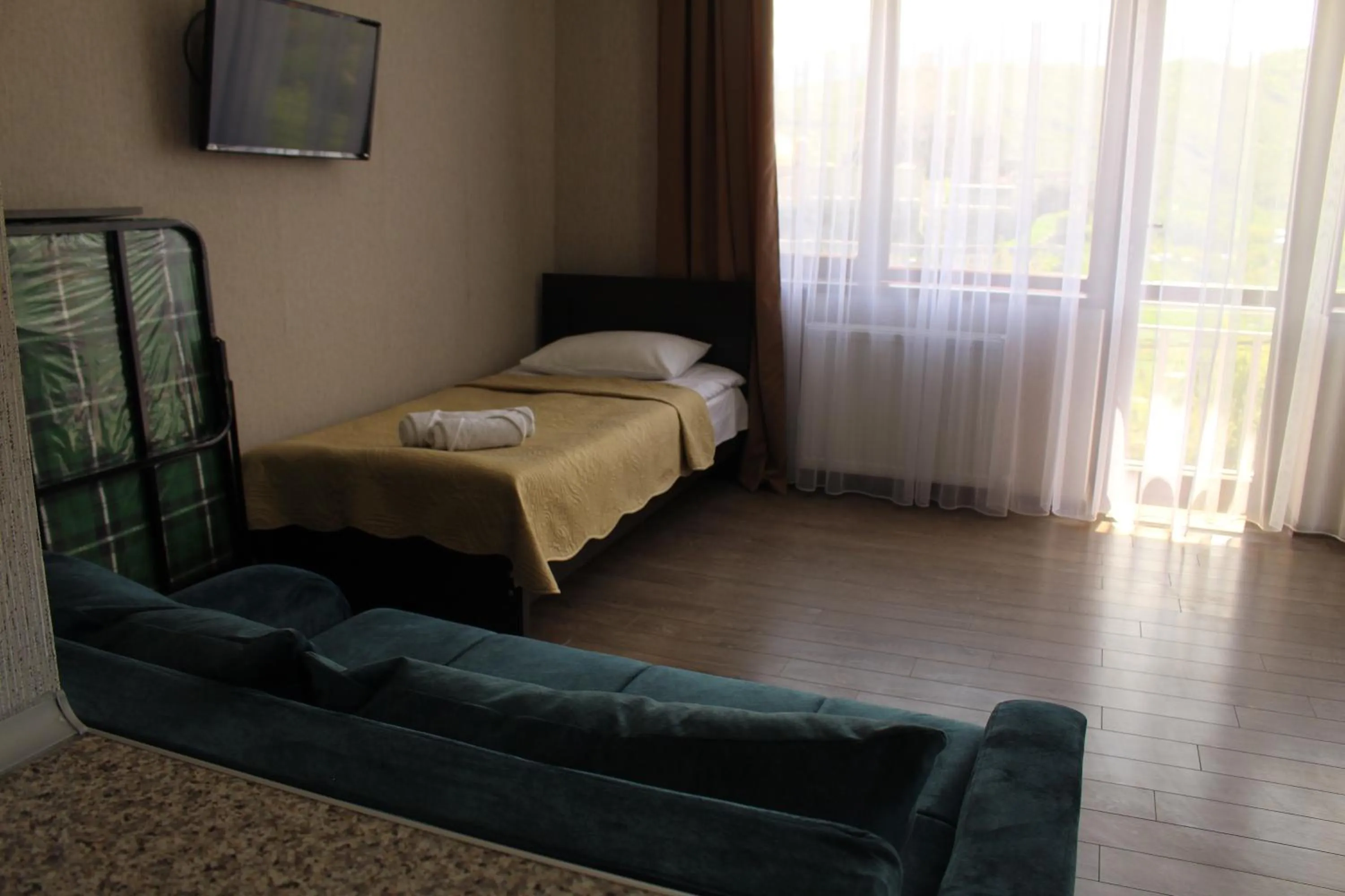 Communal lounge/ TV room, Bed in Hotel Rabati