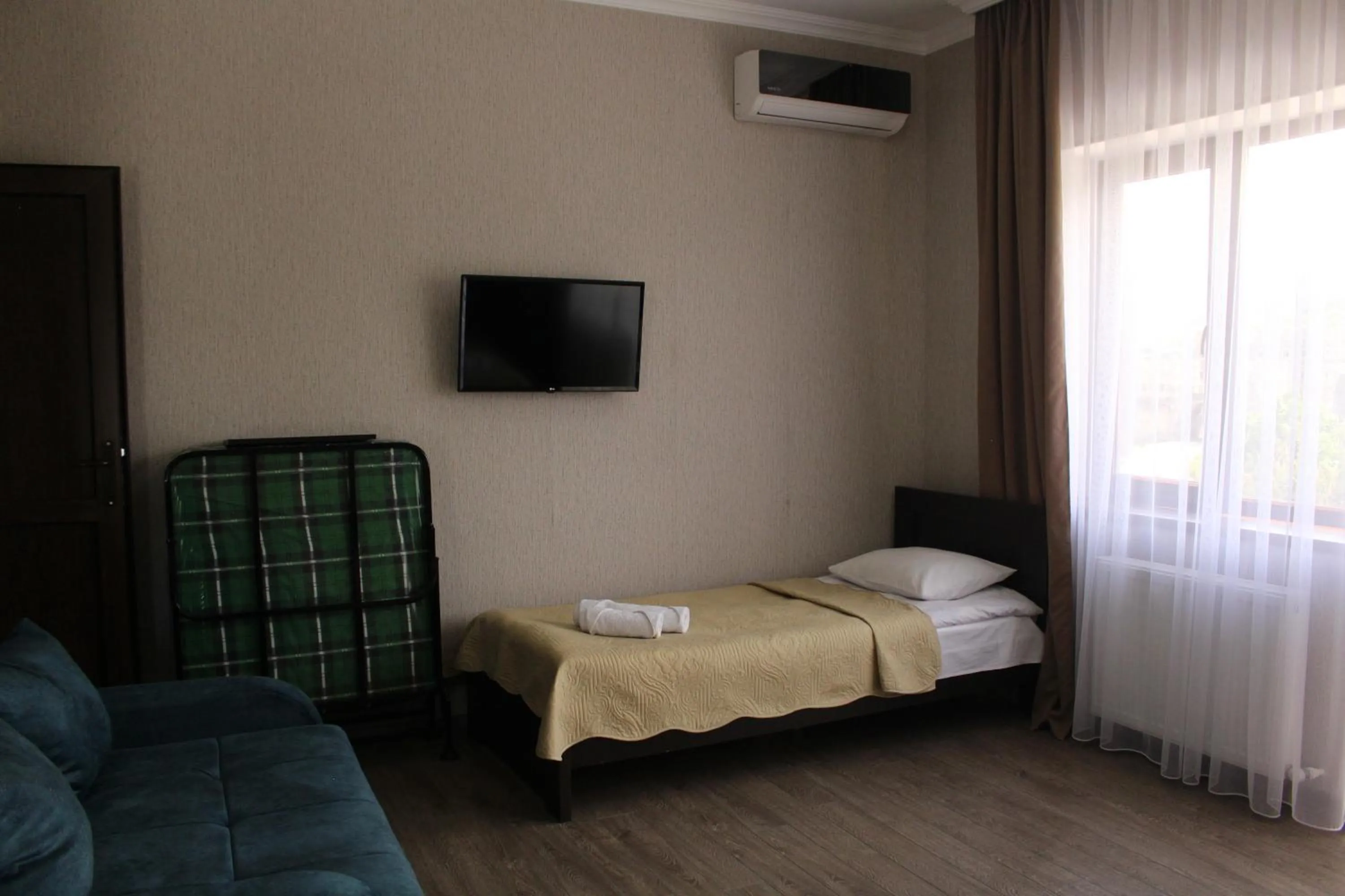 Seating area, Bed in Hotel Rabati