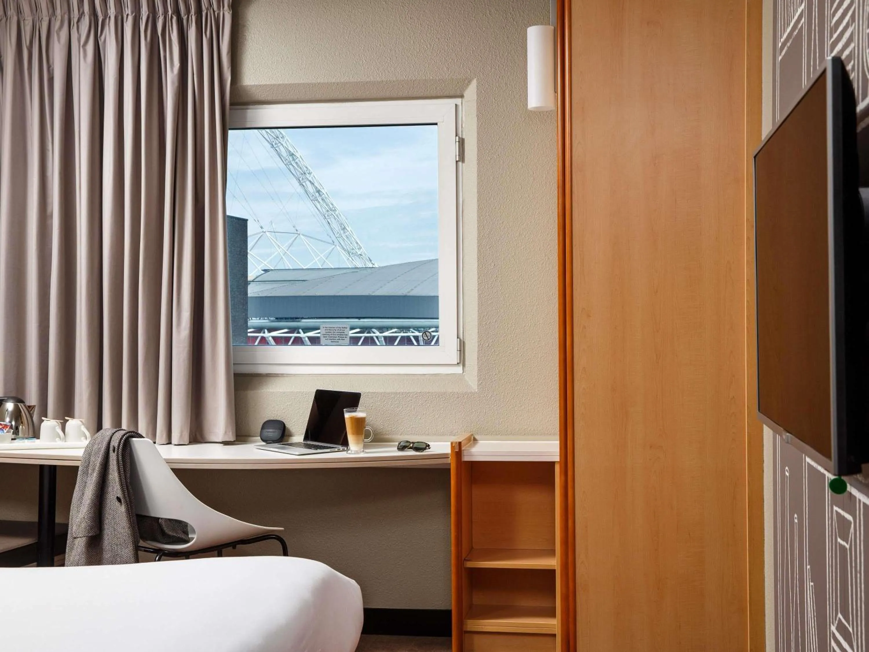 Bedroom in ibis London Wembley