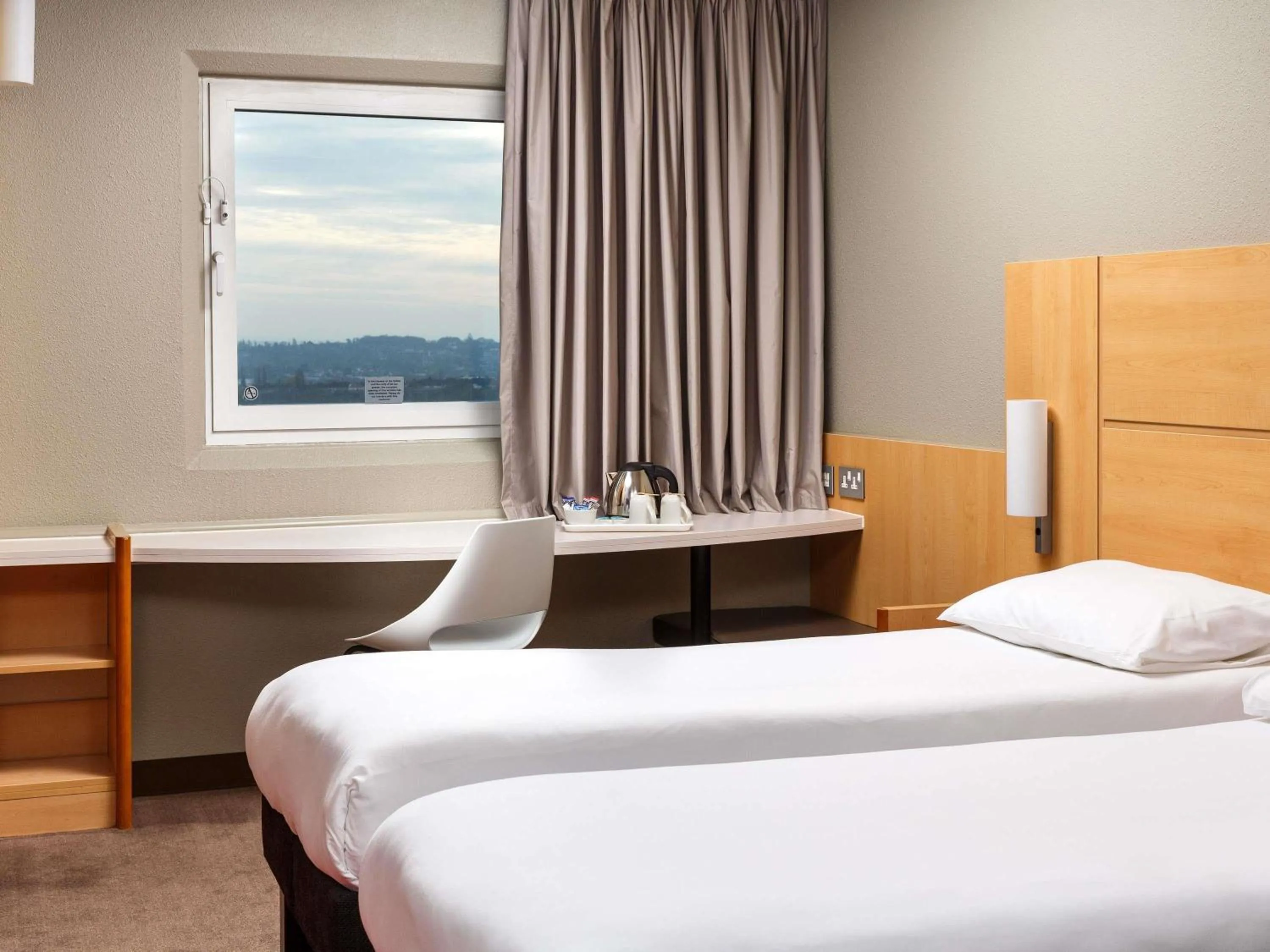 Bedroom in ibis London Wembley