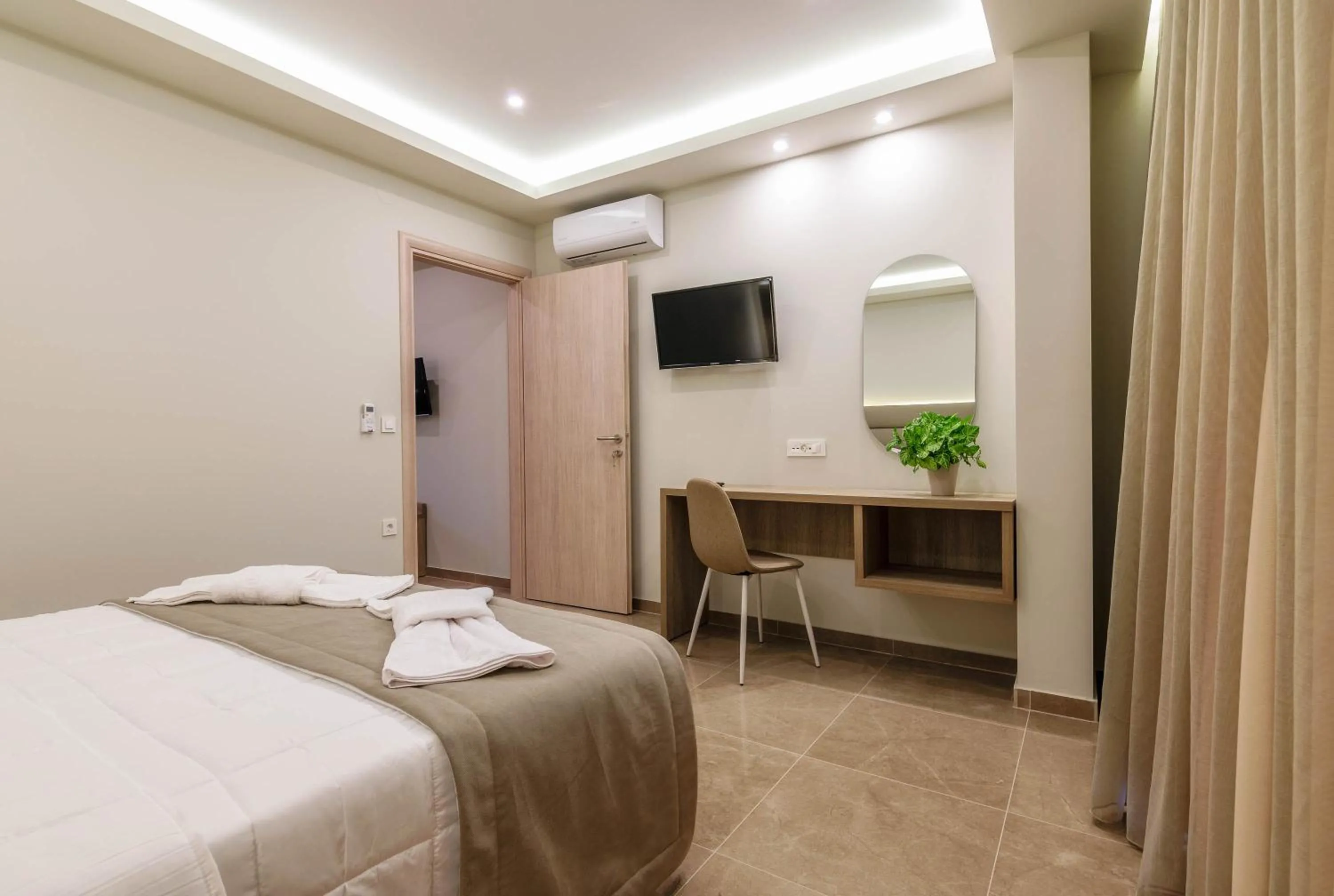 Bed in Remezzo Studios & Apartments