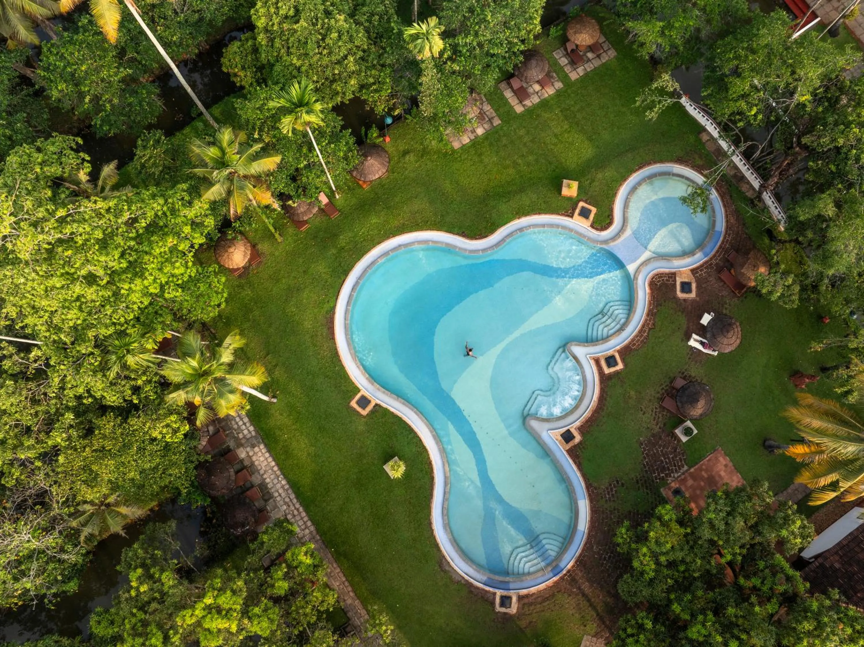 Swimming pool in Coconut Lagoon Kumarakom - A CGH Earth Experience