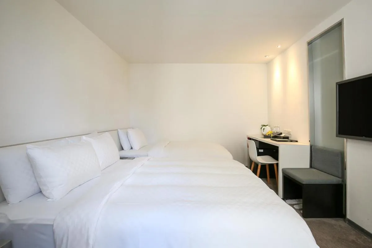 Bed in CityInn Hotel Taipei Station Branch II