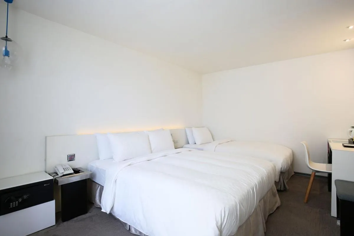 Bed in CityInn Hotel Taipei Station Branch II