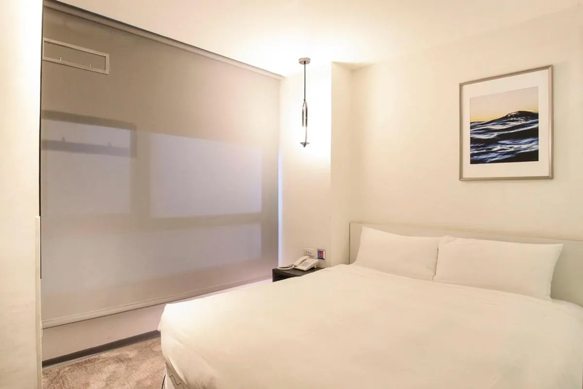 Bed in CityInn Hotel Taipei Station Branch III