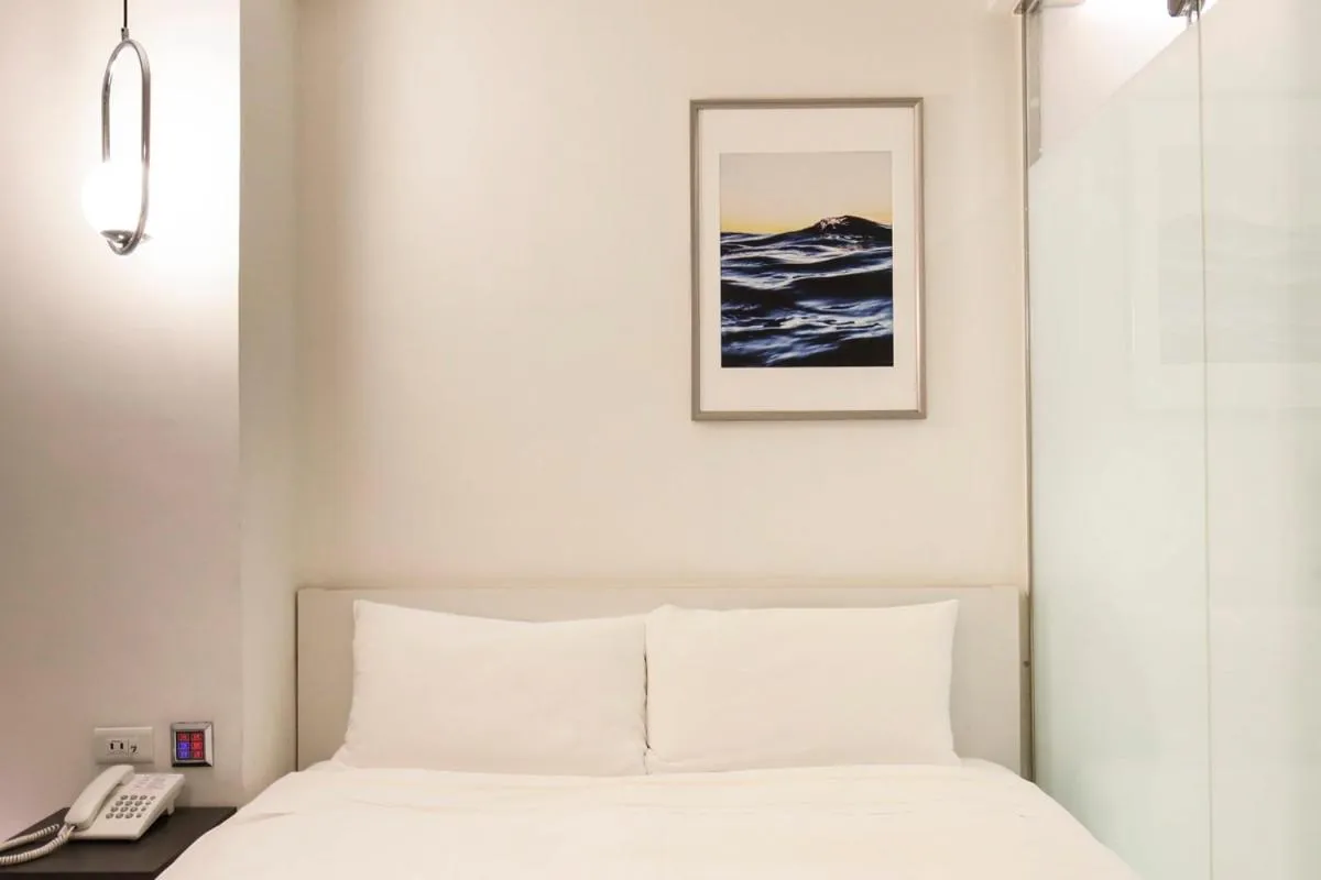 Bed in CityInn Hotel Taipei Station Branch III