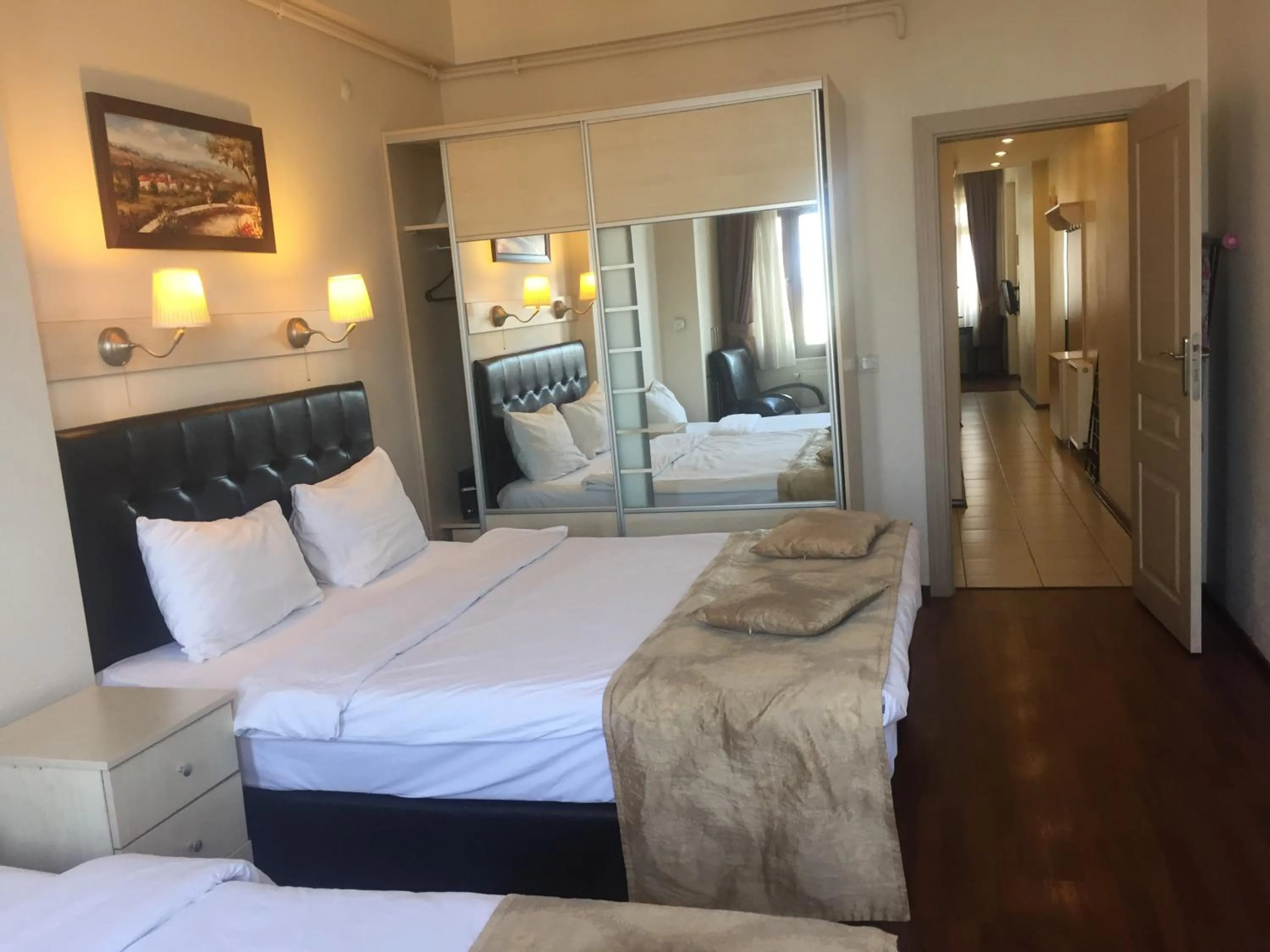 Bed in Taksim House Suites