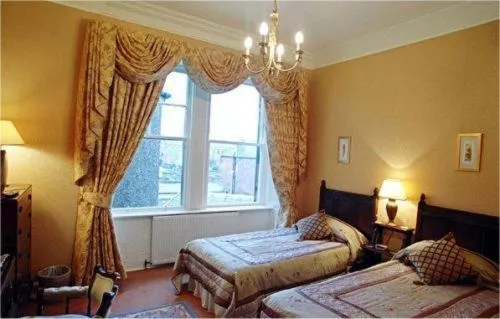 Bed in The Arrandale Hotel