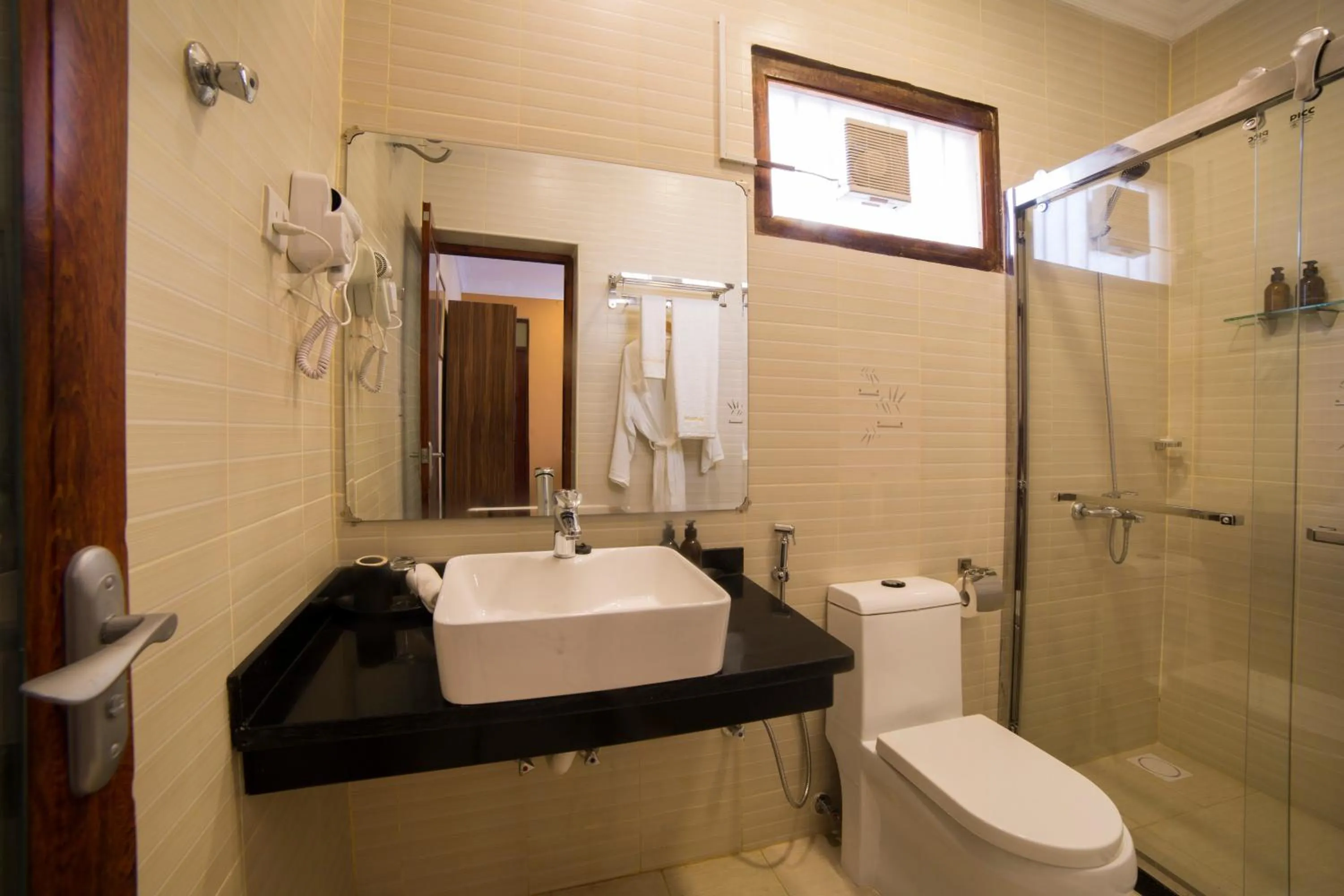 Bathroom in Spice Palace Hotel