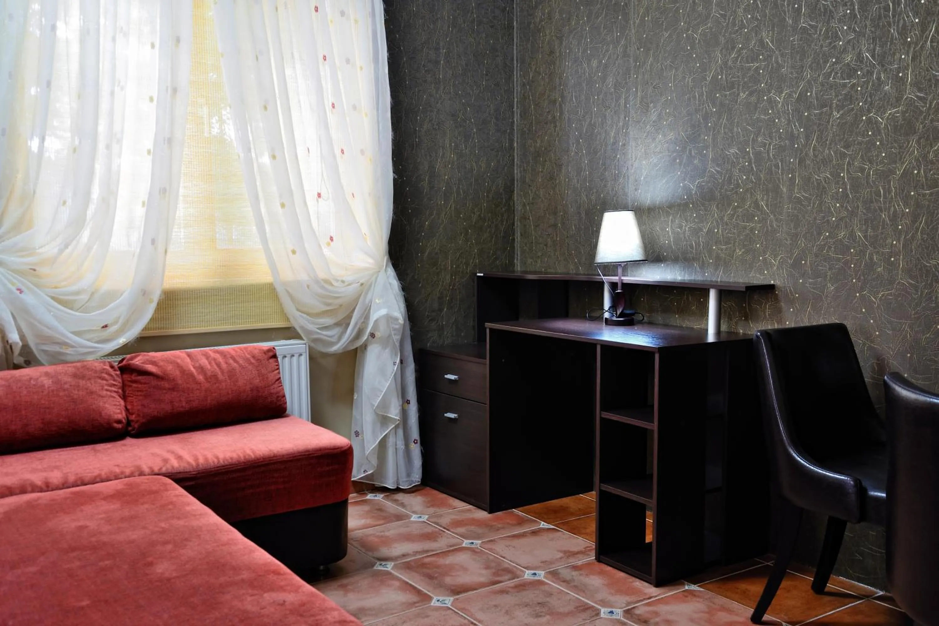 Living room, Bed in Aurora Resort & Spa