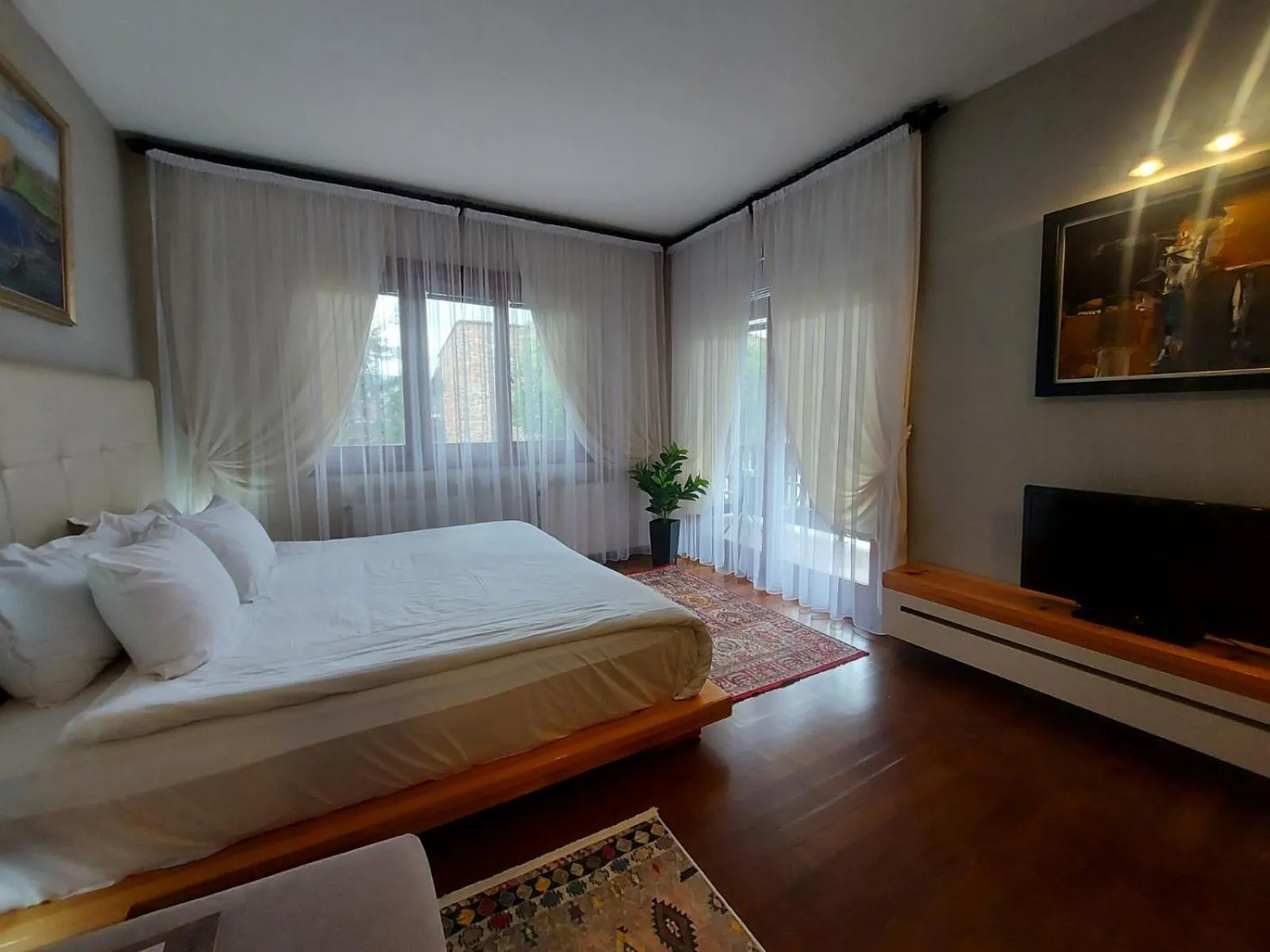 Bed in Aurora Resort & Spa