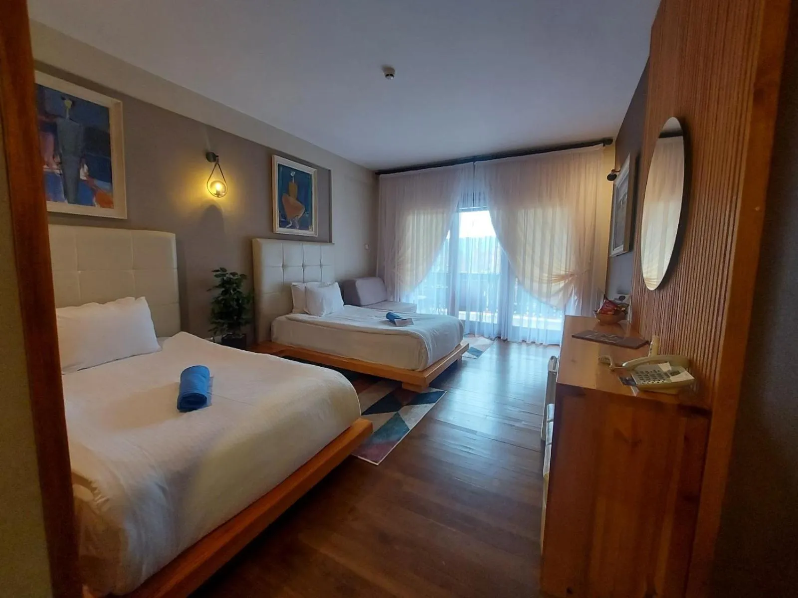 Bed in Aurora Resort & Spa