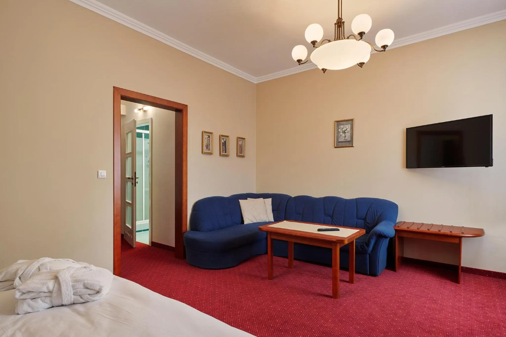 Living room, Bed in Wellness Hotel Lužan