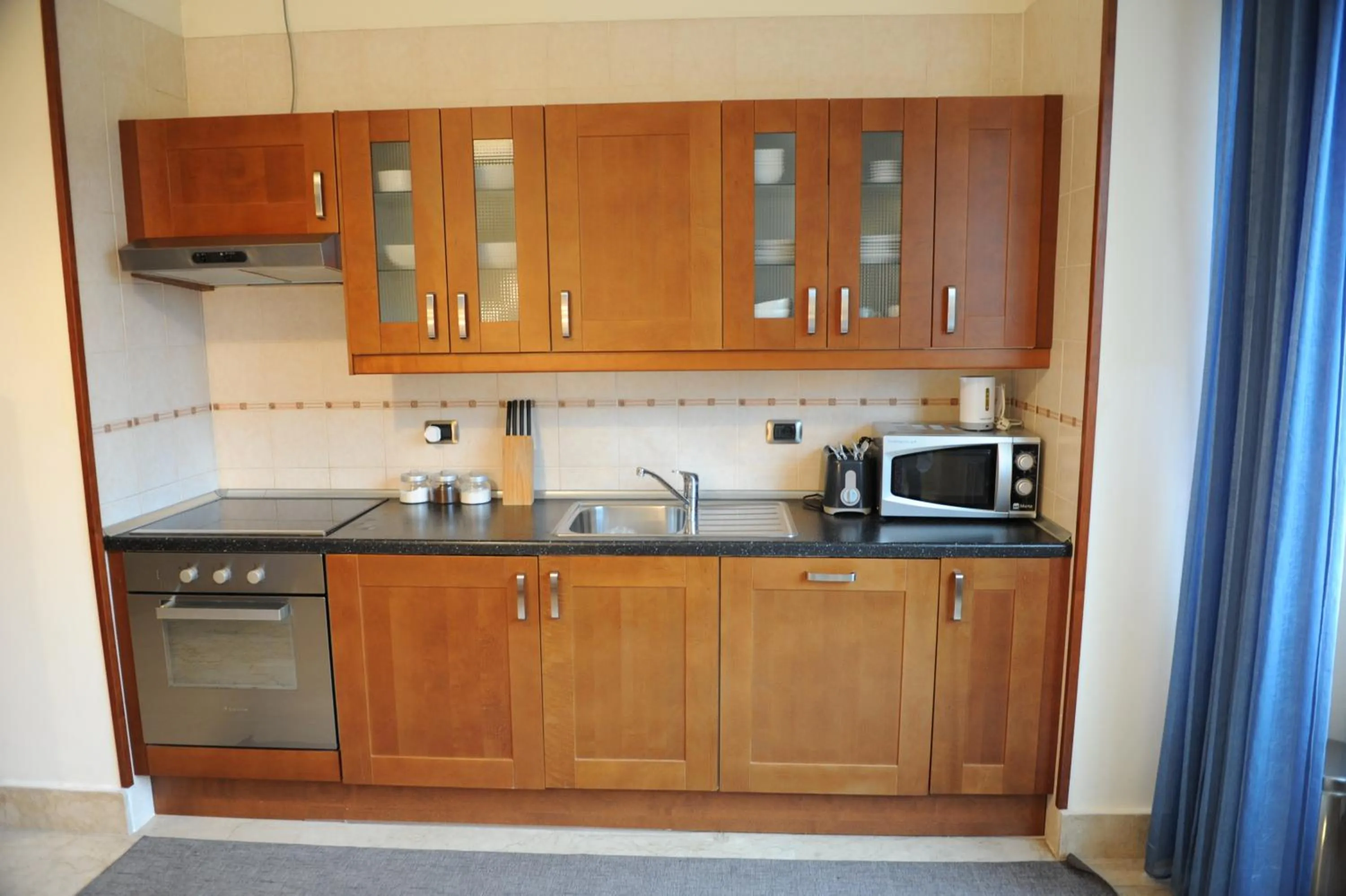 Kitchen or kitchenette in Lux Appartamenti