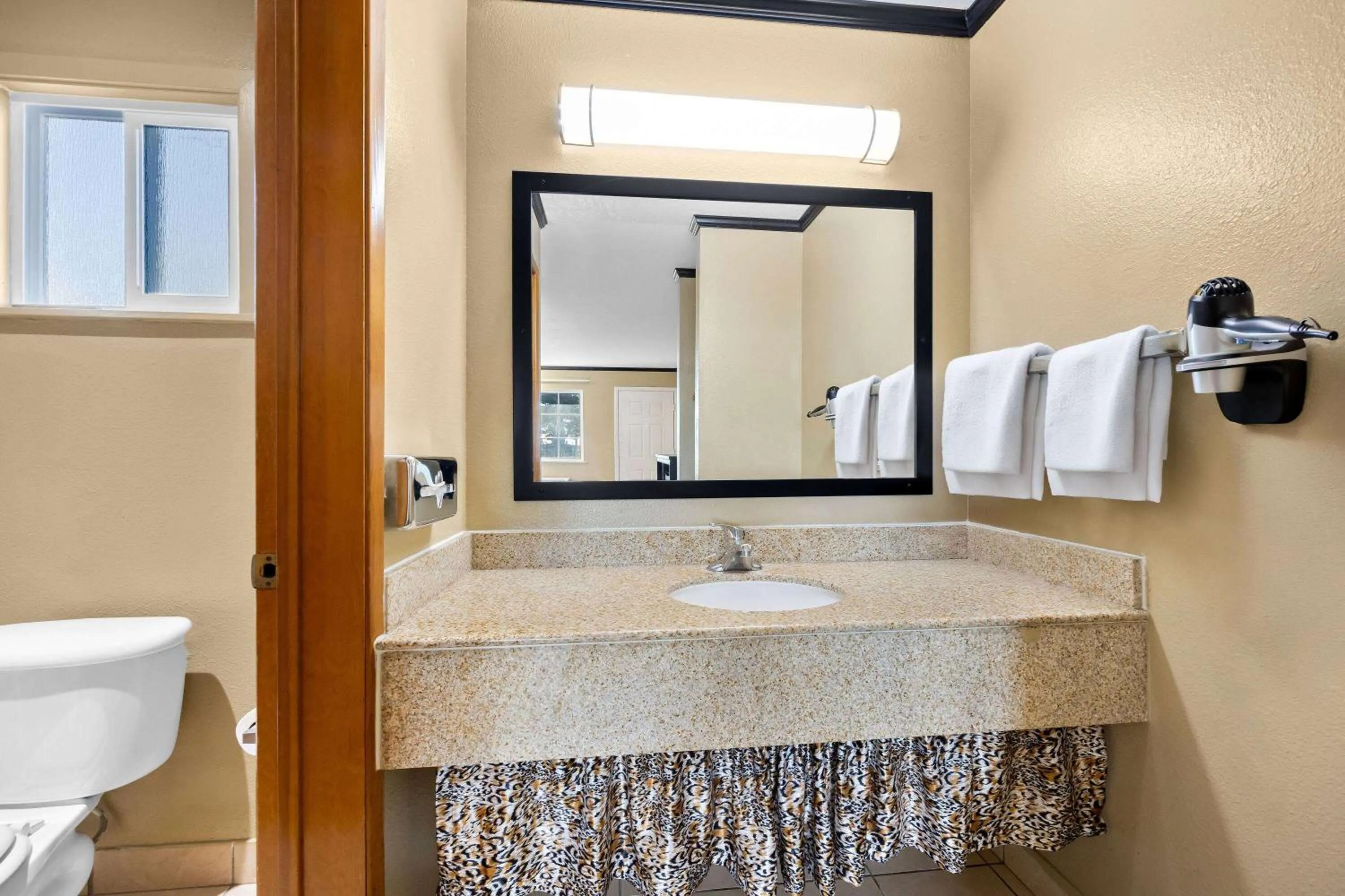 Bathroom in Super 8 by Wyndham Crescent City