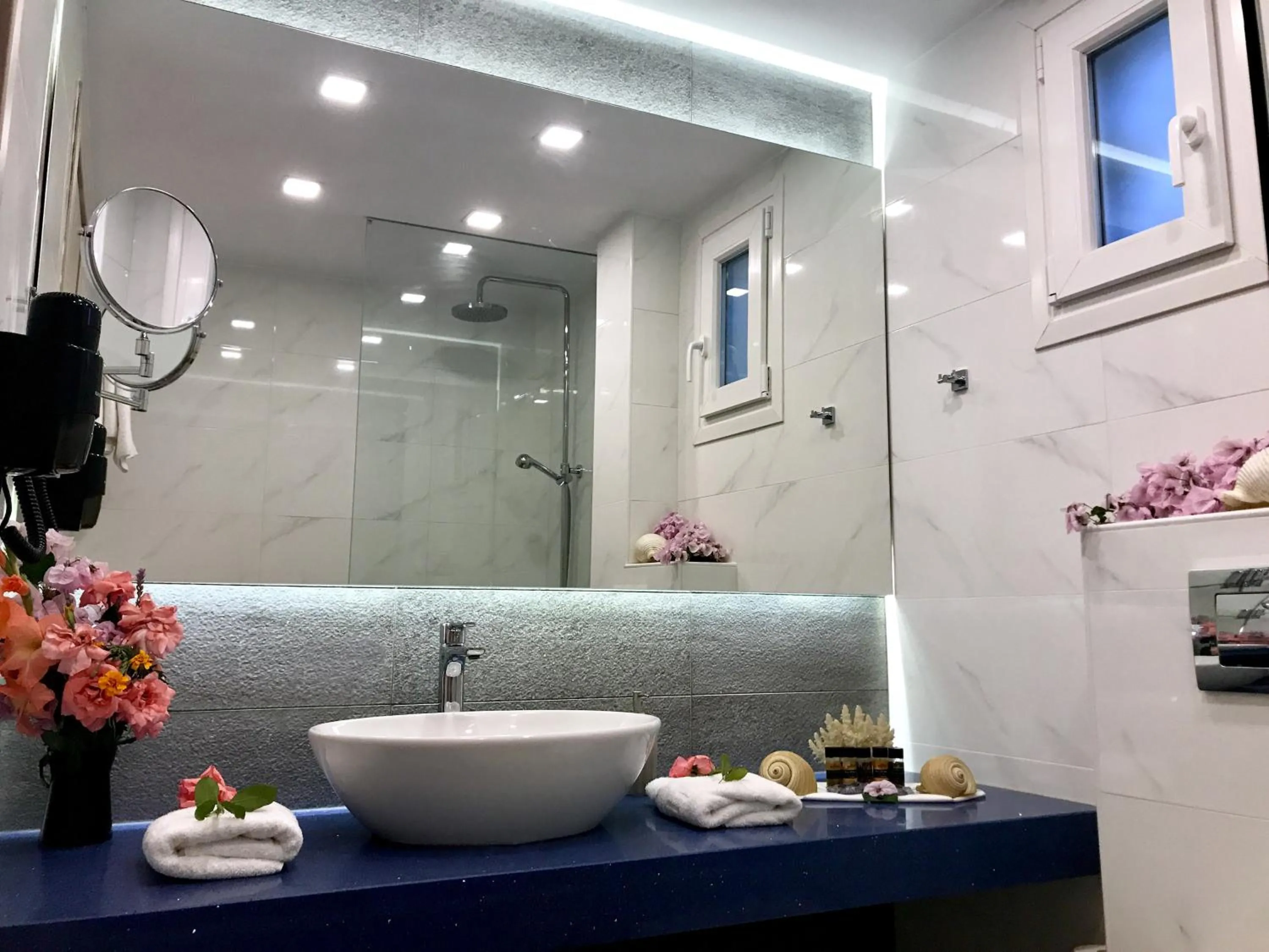 Bathroom in IONIAN SUITES by Bruskos