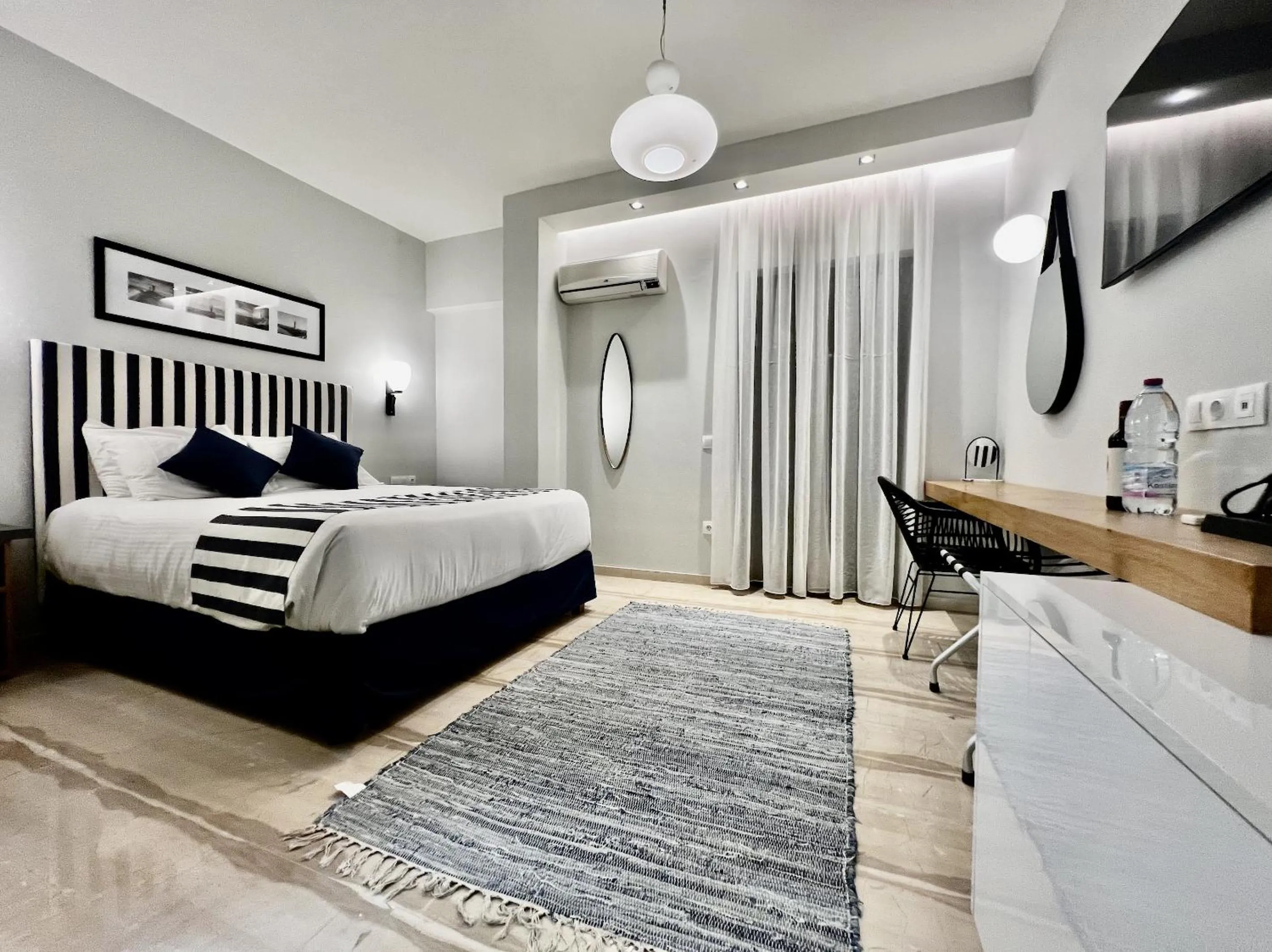 Photo of the whole room in IONIAN SUITES by Bruskos