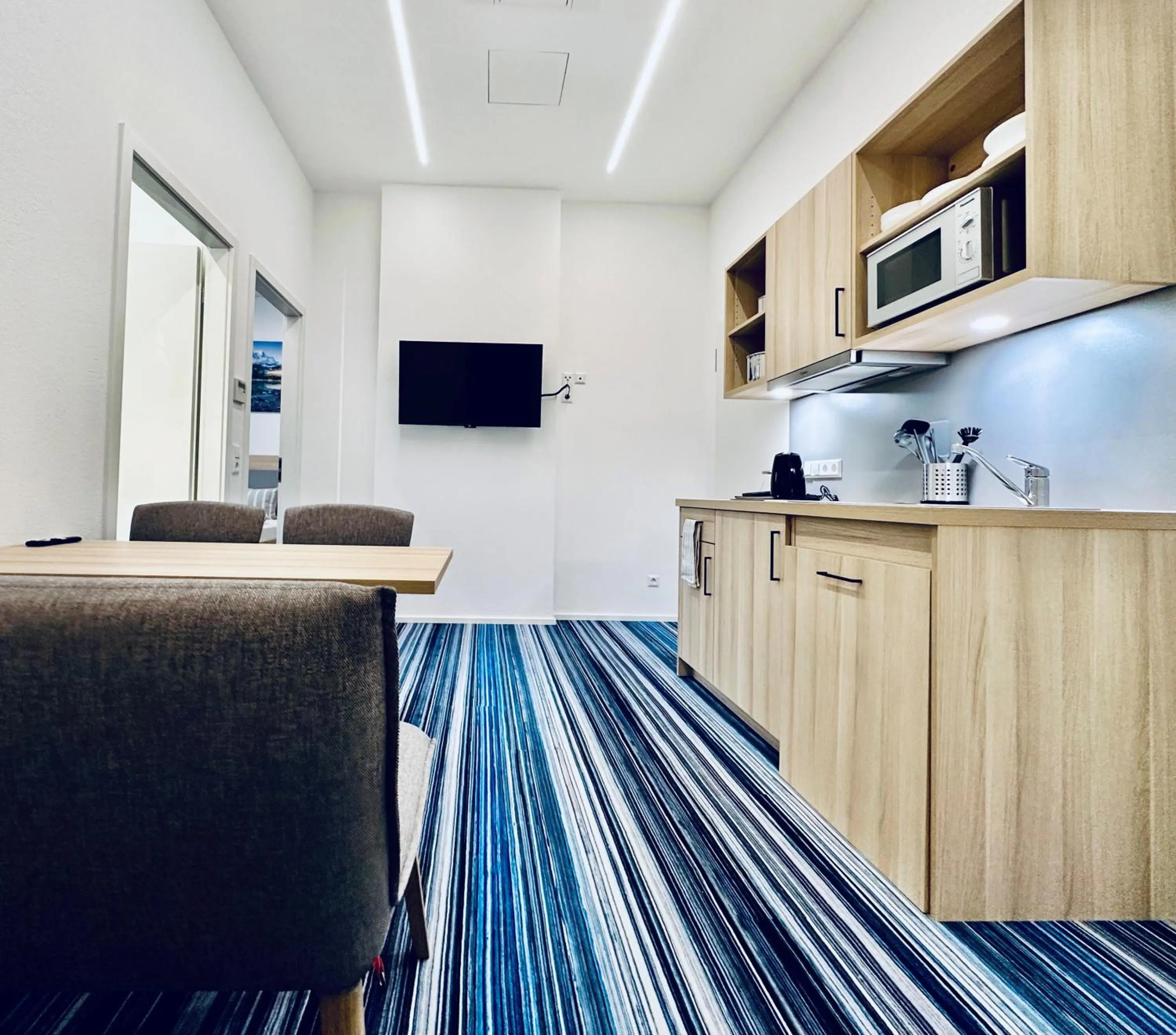 Kitchen or kitchenette in Hotel Lumi