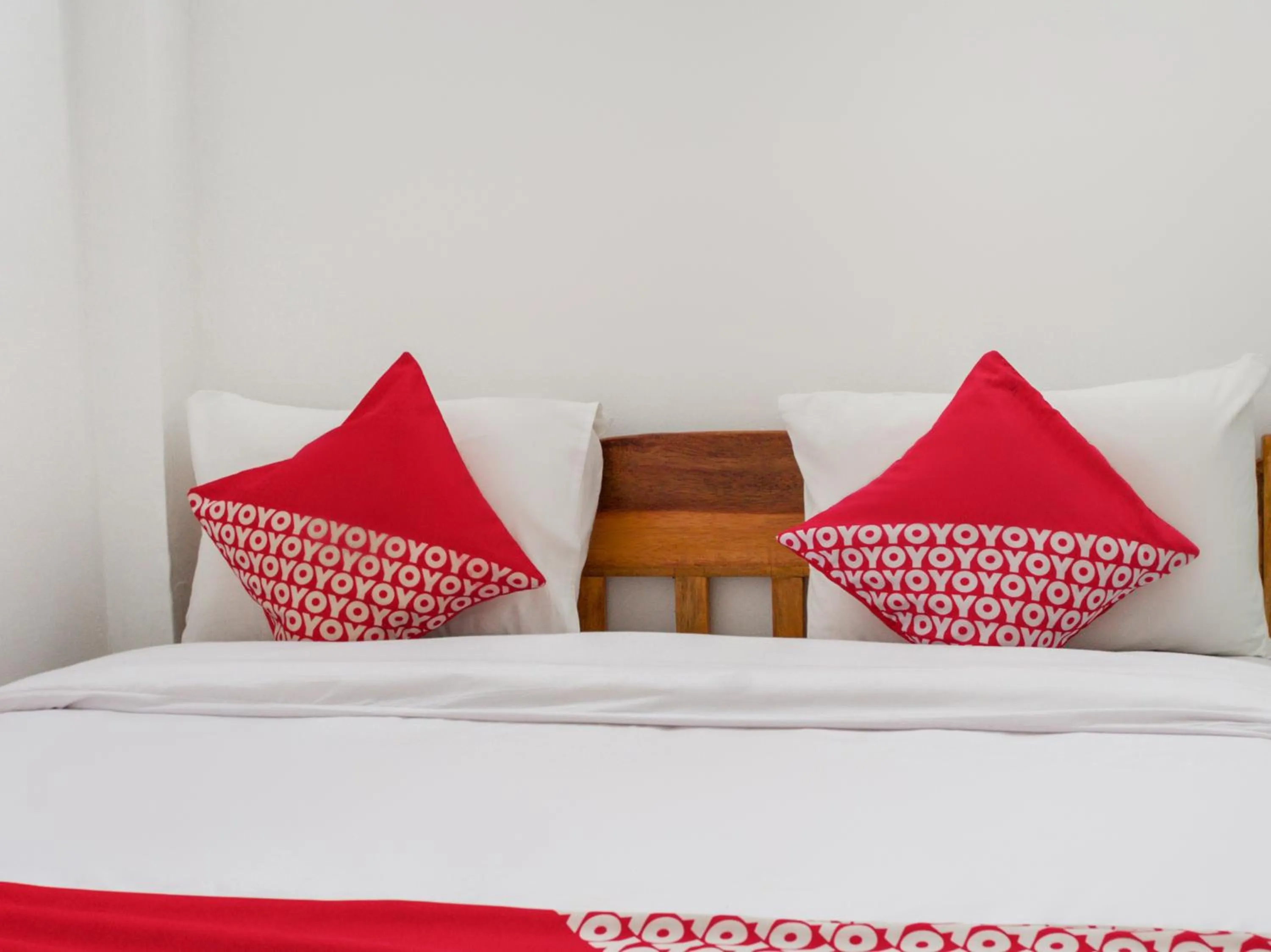 Bedroom in OYO 447 Hutasimo Residence