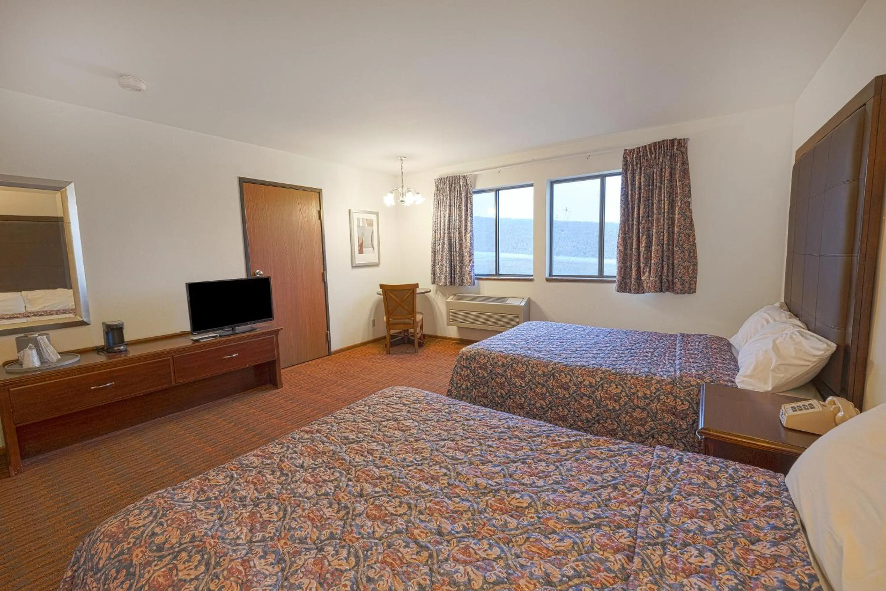 Bedroom, Bed in Harlan Inn and Suites By OYO Harlan