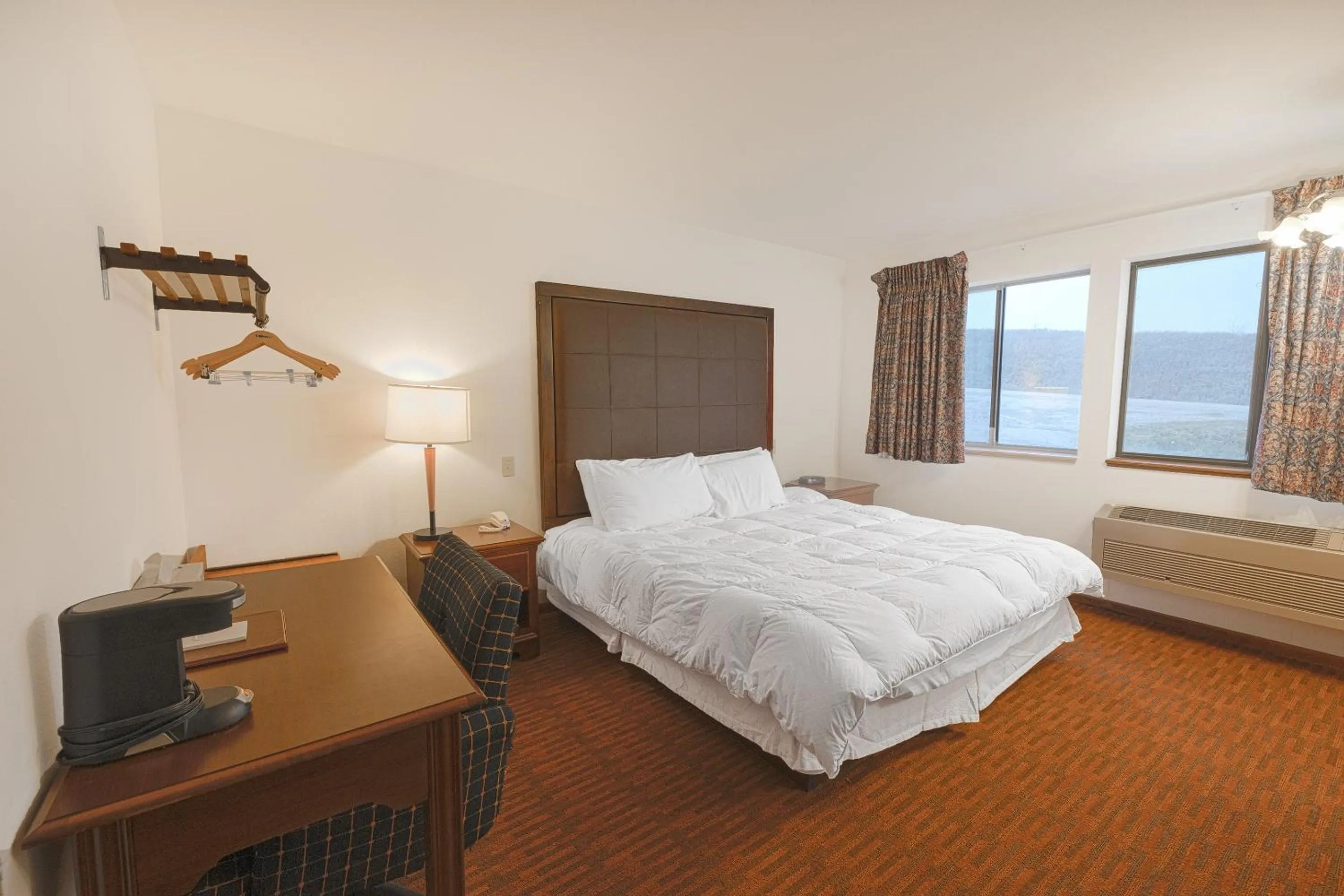 Bedroom, Bed in Harlan Inn and Suites By OYO Harlan