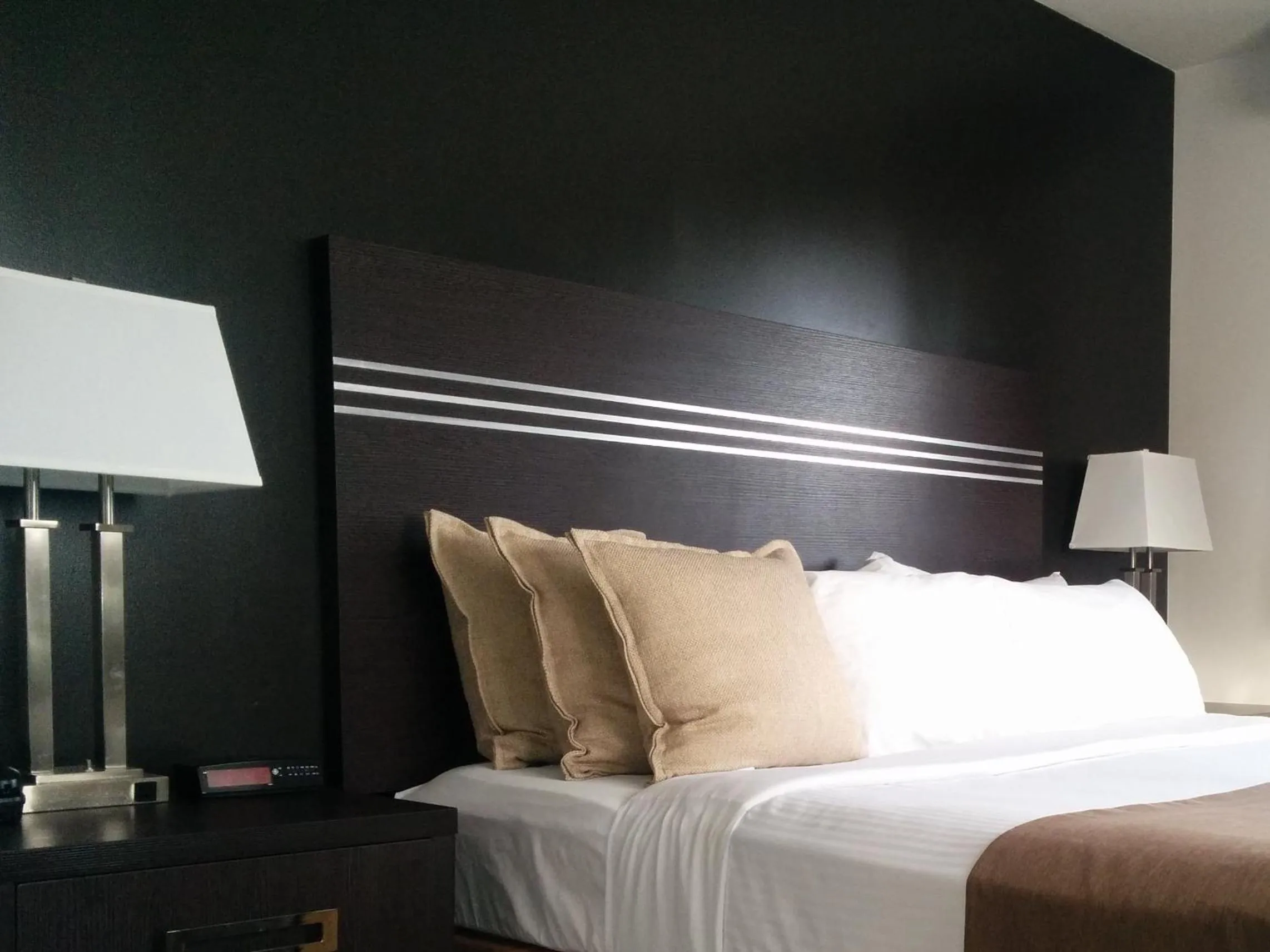 Decorative detail, Bed in Super 8 by Wyndham Valemount