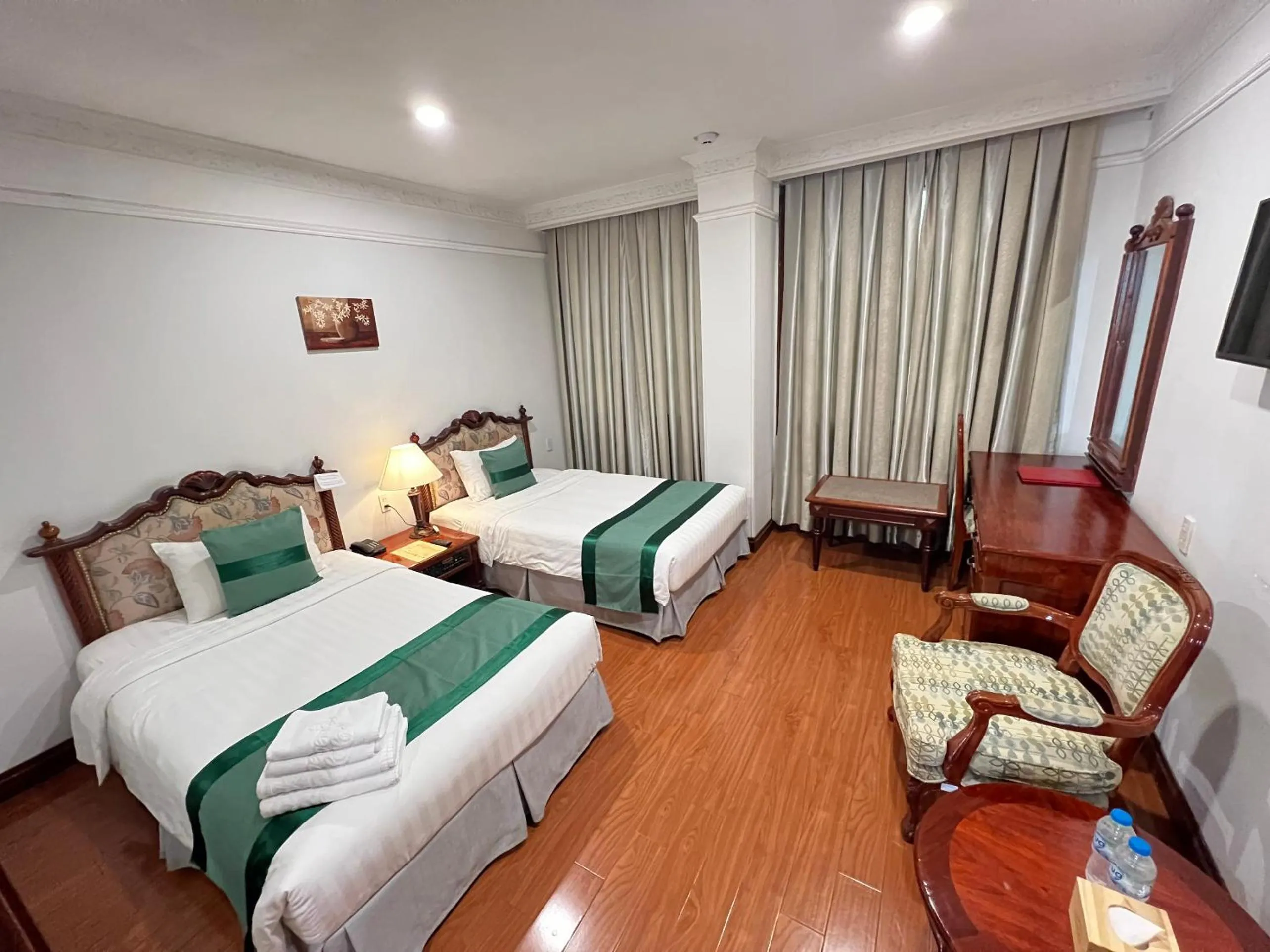 Bed in Riverside Hotel Saigon