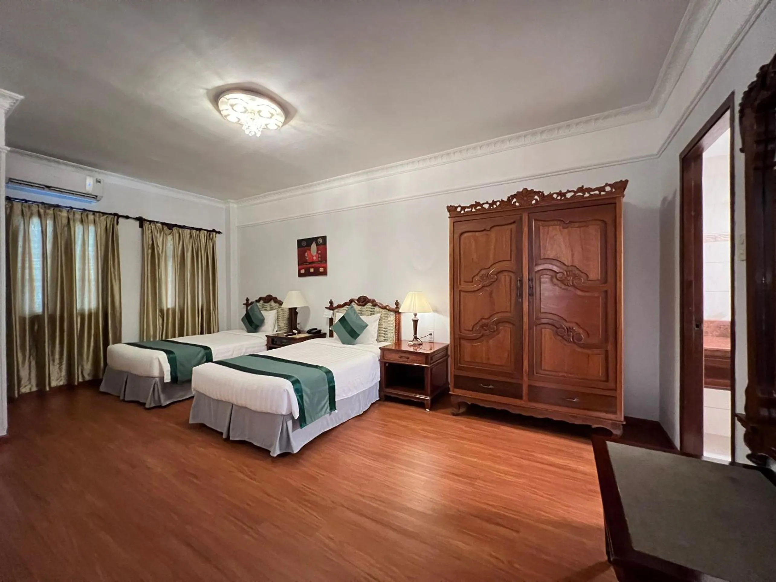 Bed in Riverside Hotel Saigon