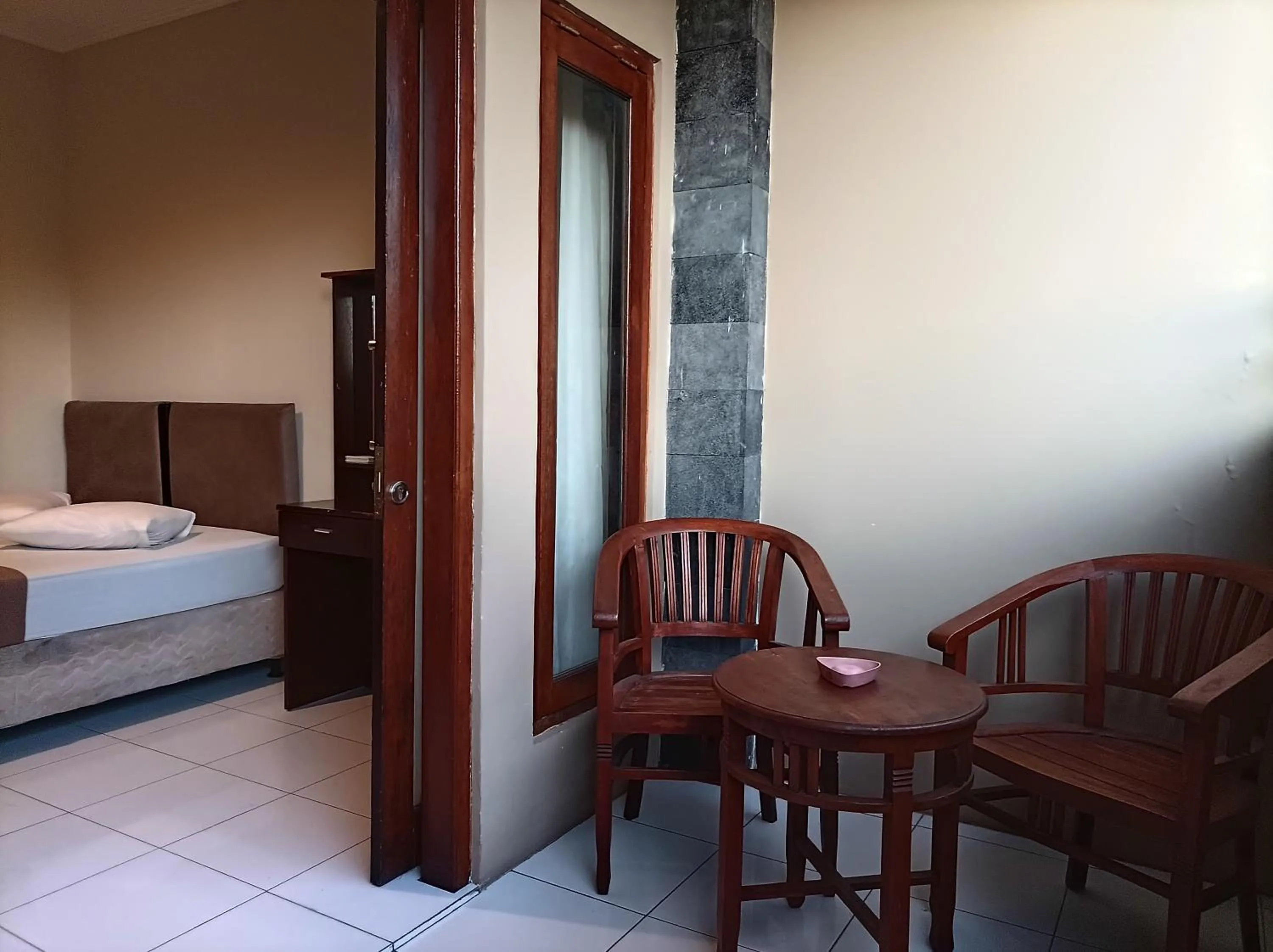 Balcony/Terrace, Bed in Sapta Petala Hotel