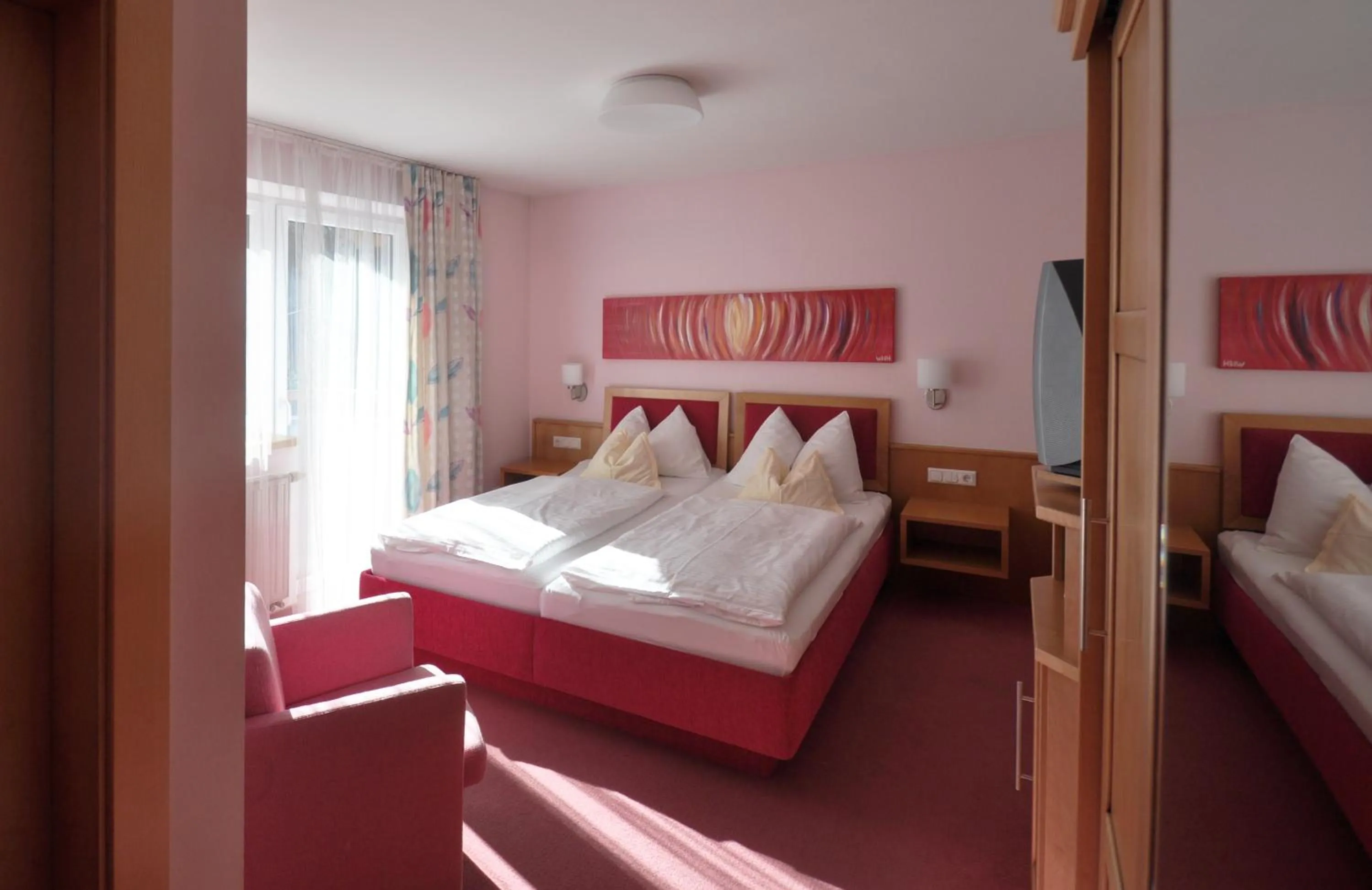 Photo of the whole room, Bed in Impuls Hotel Tirol