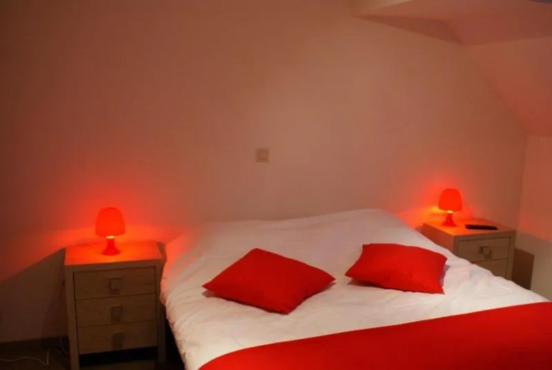 Bed in Auberge Le Temps des Saveurs