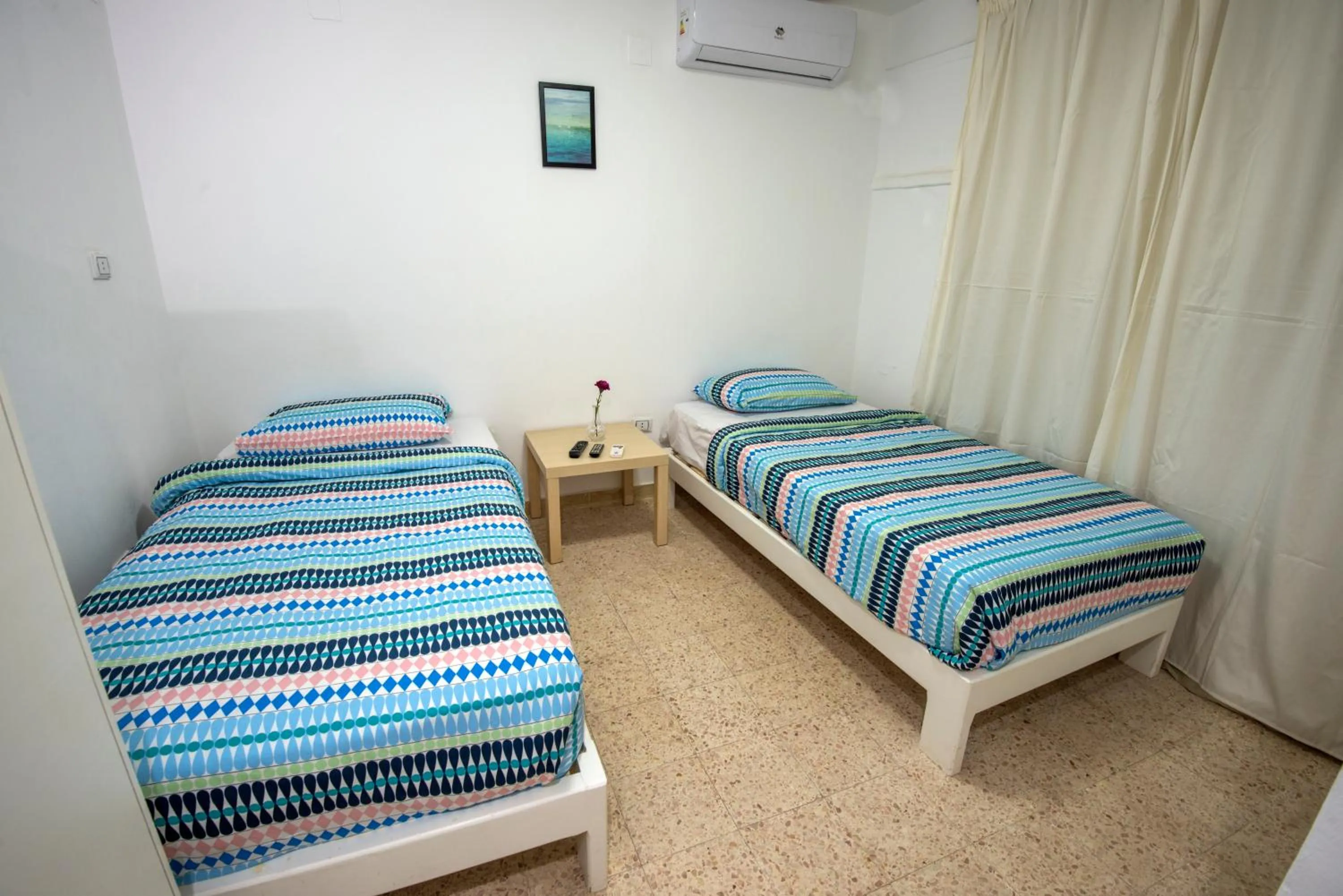 Bed in Lilly Rooms and Studio