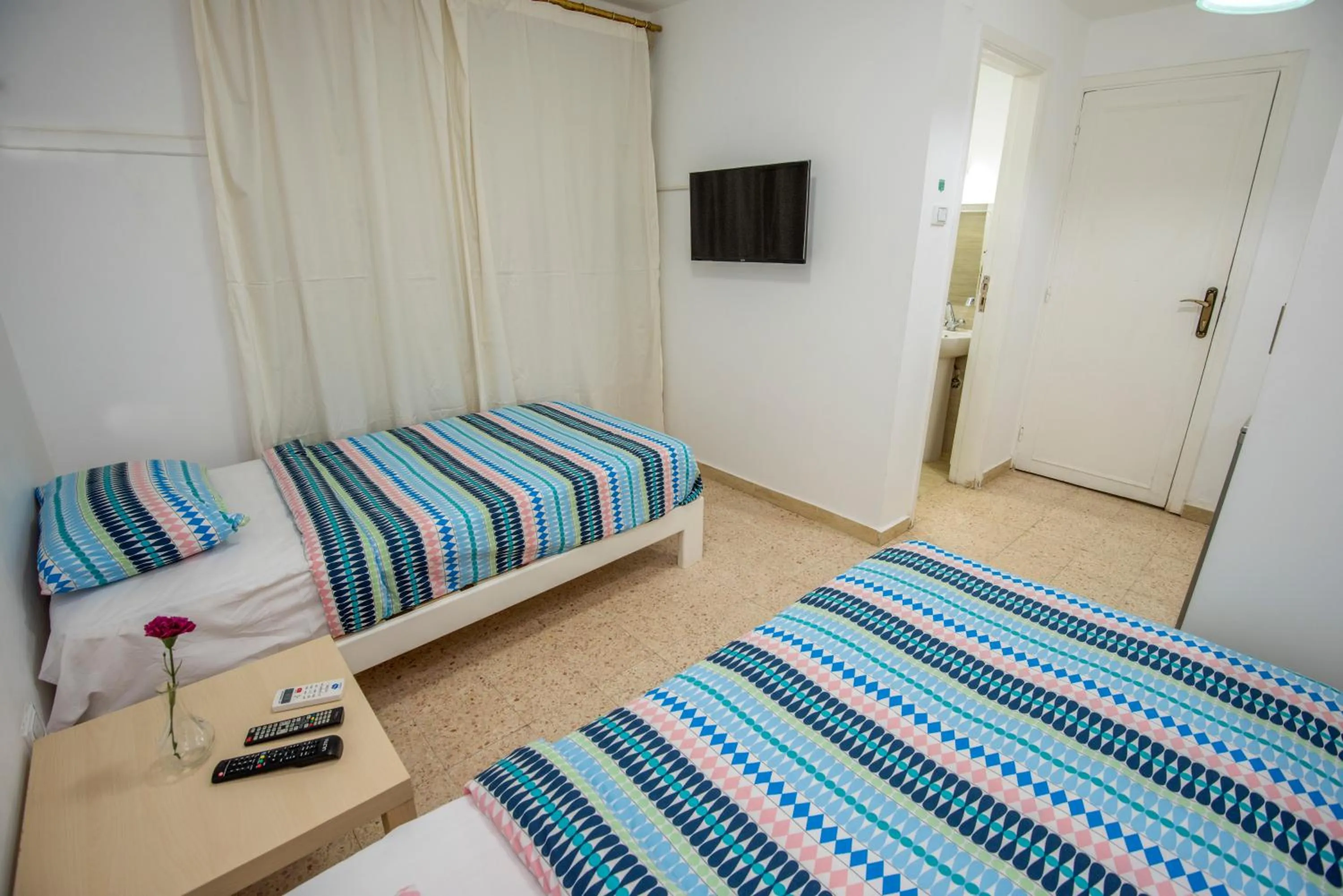 Bed in Lilly Rooms and Studio