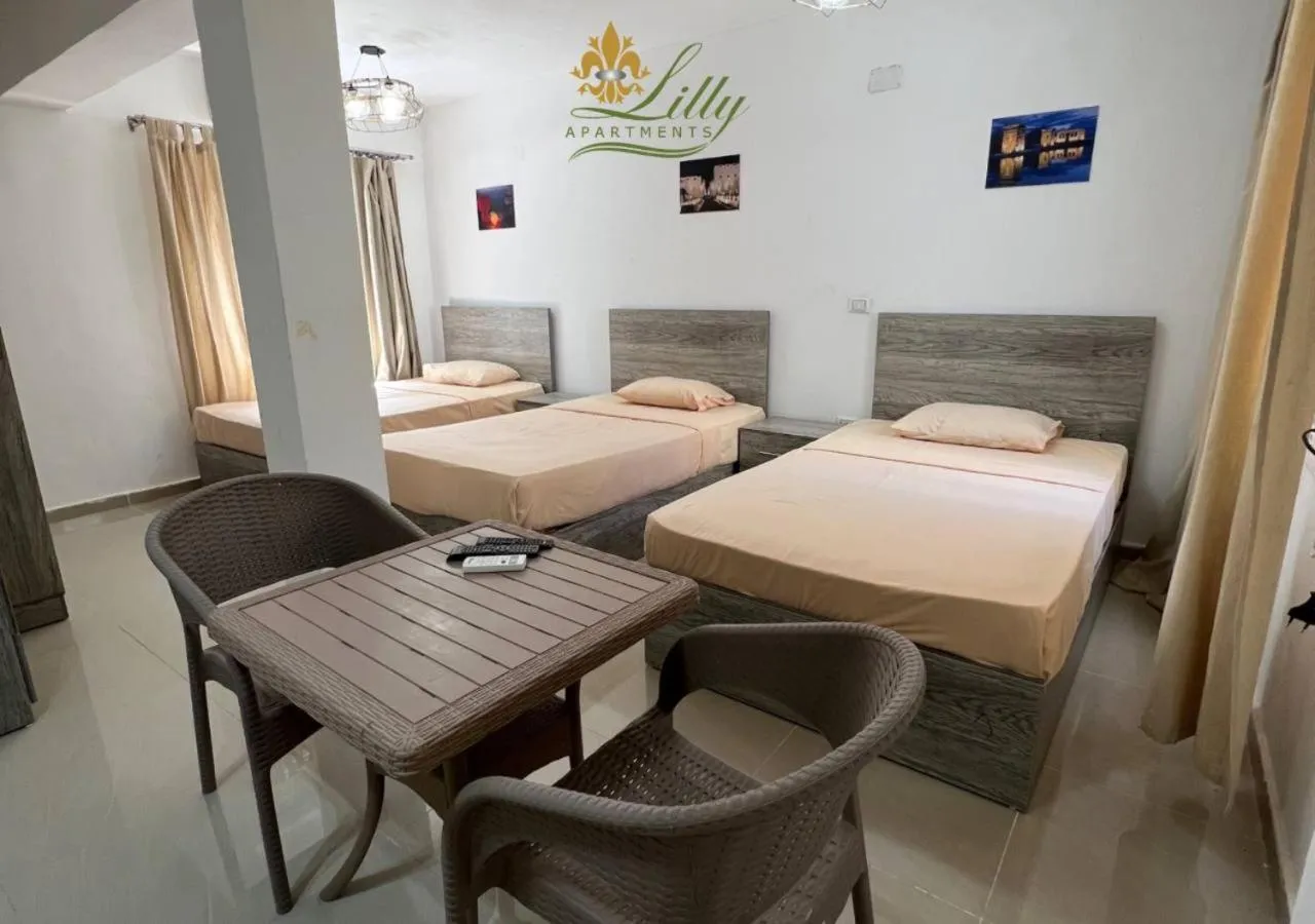 Triple Room with Garden View in Lilly Rooms and Studio