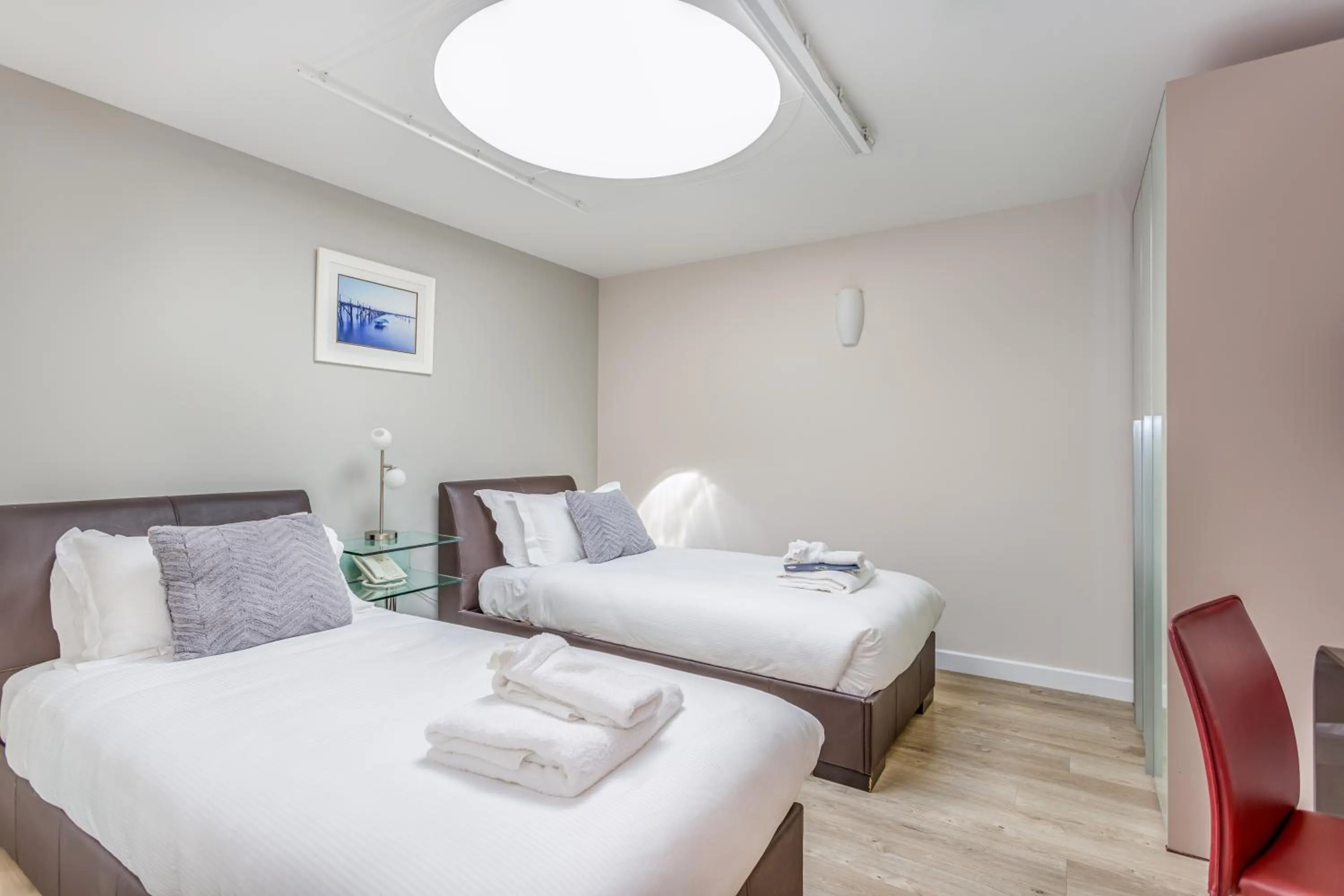 Bed in Captain's Club Hotel & Spa