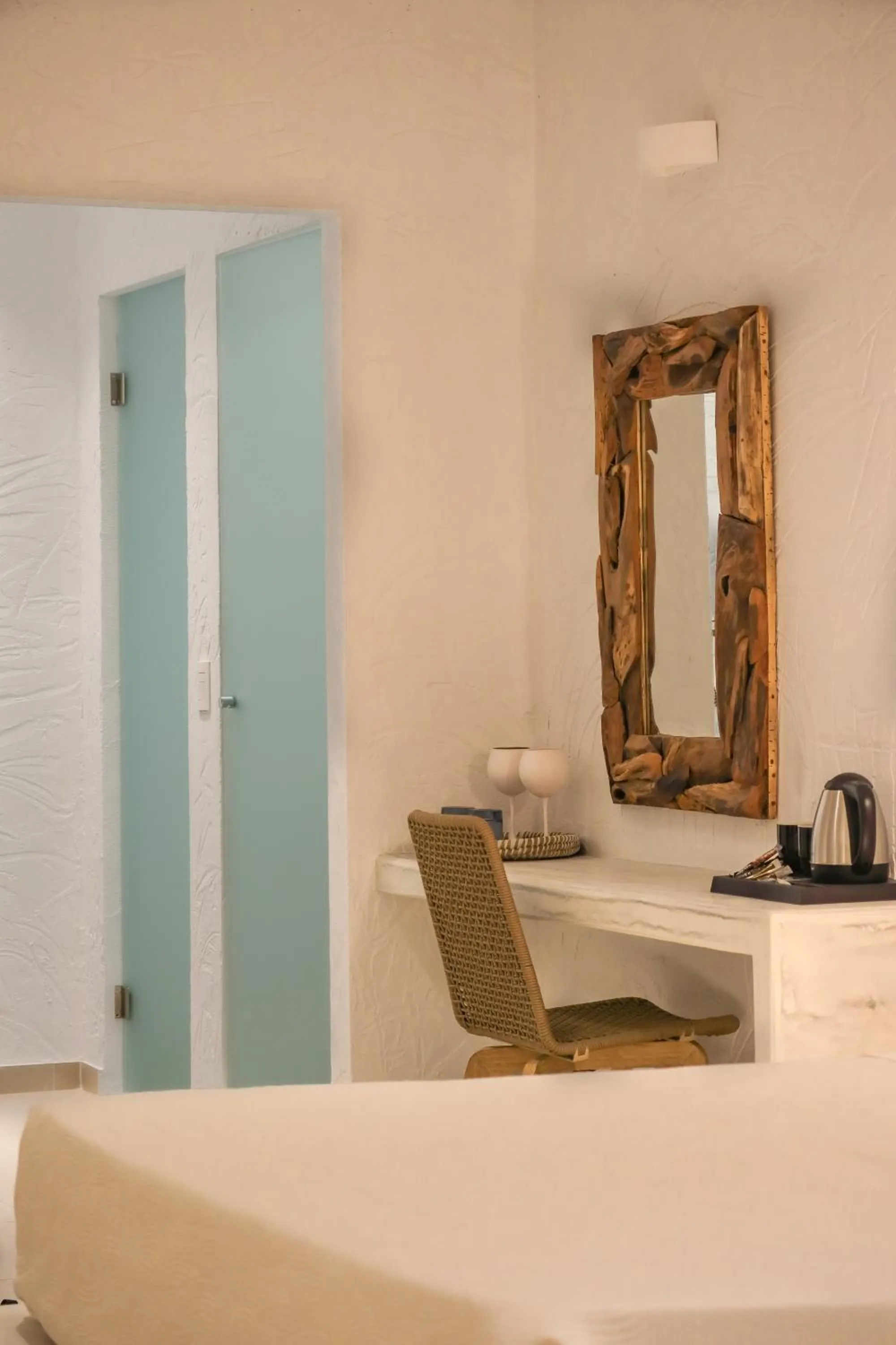 Bed in Delfini Beach Hotel & Suites