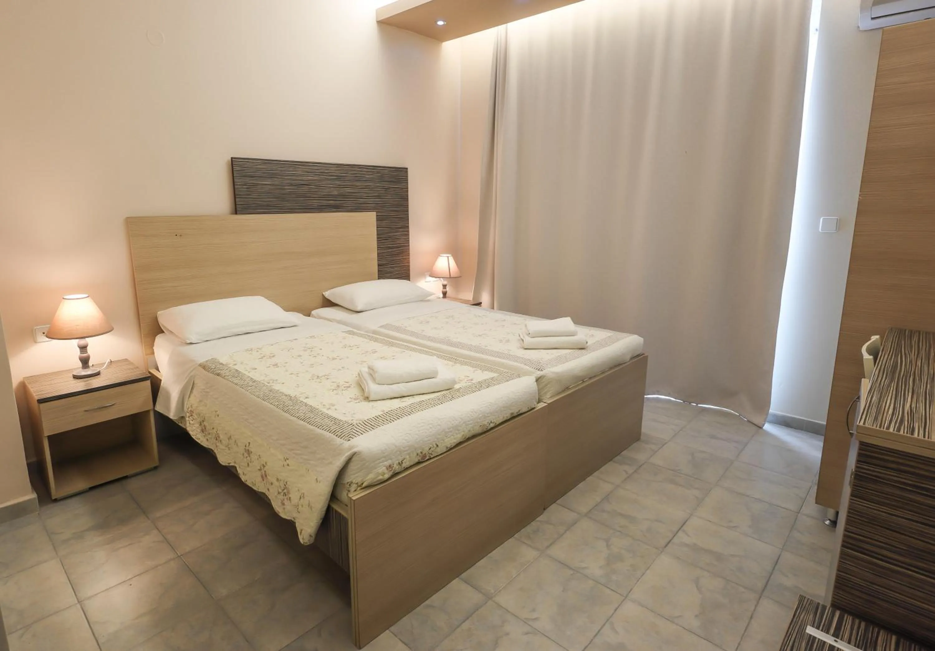 Delfini Beach Hotel & Suites