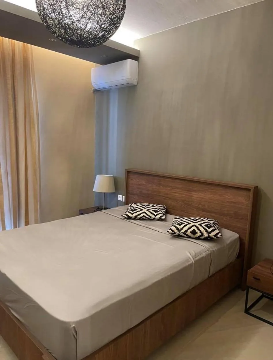 Delfini Beach Hotel & Suites