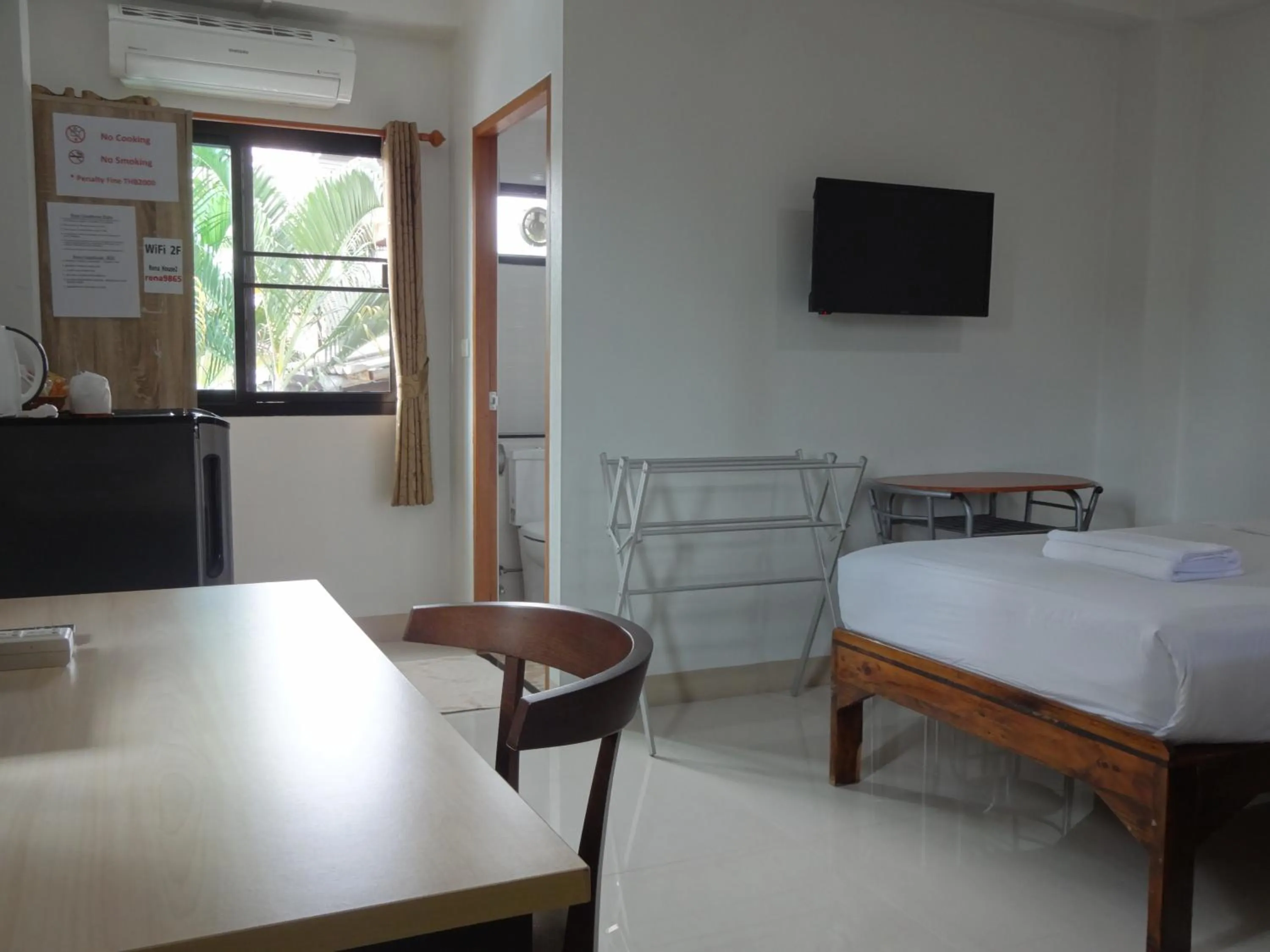 Photo of the whole room, Bed in Rena House Chiang Mai