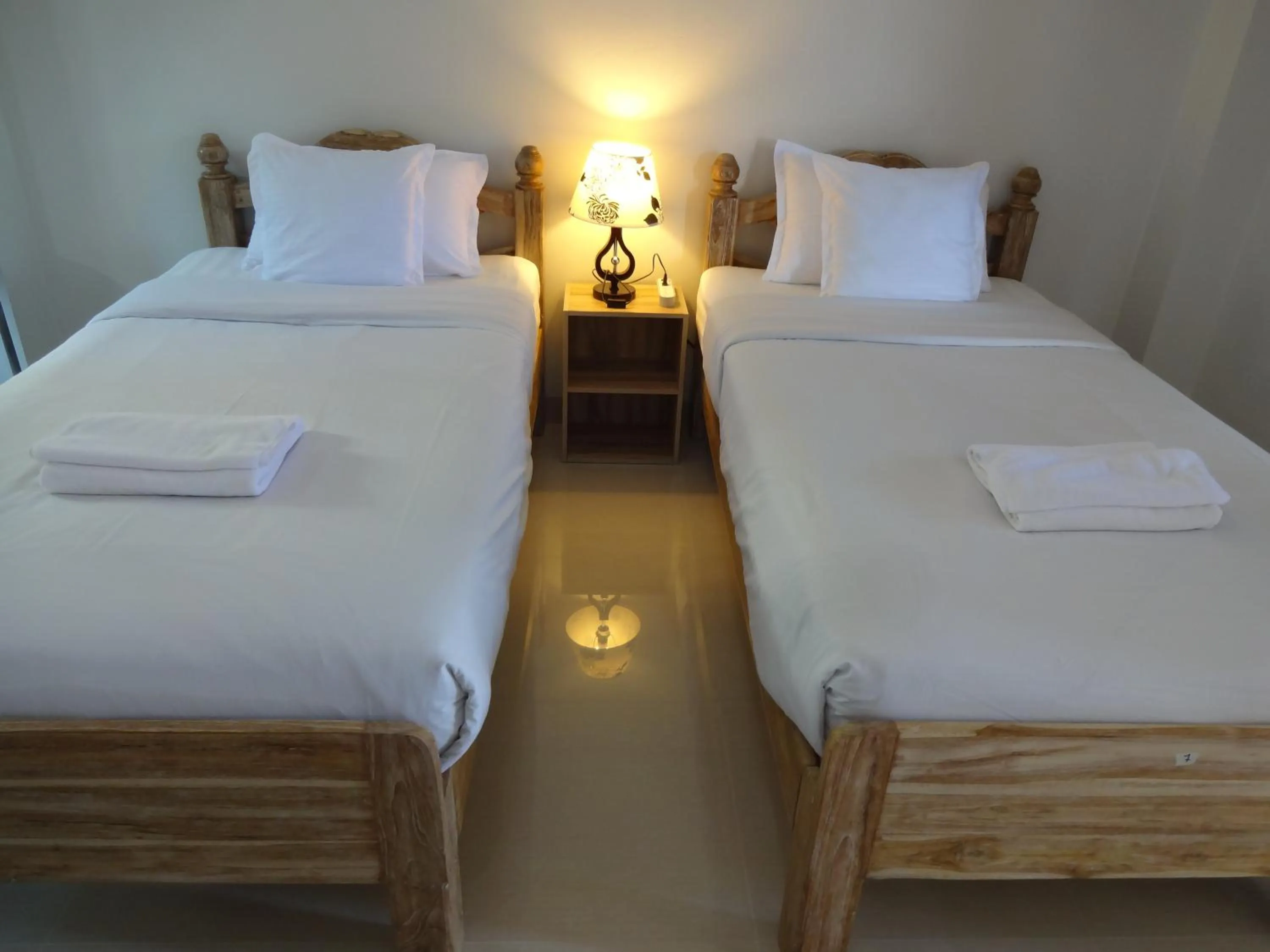 Bed in Rena House Chiang Mai